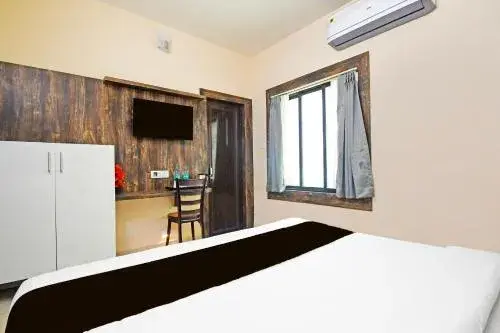Classic Triple Room - single occupancy in Super Collection O Gandhi Ghat Formerly Sai Resorts Classic Triple Room - single occupancy in Super Collection O Gandhi Ghat Formerly Sai Resorts