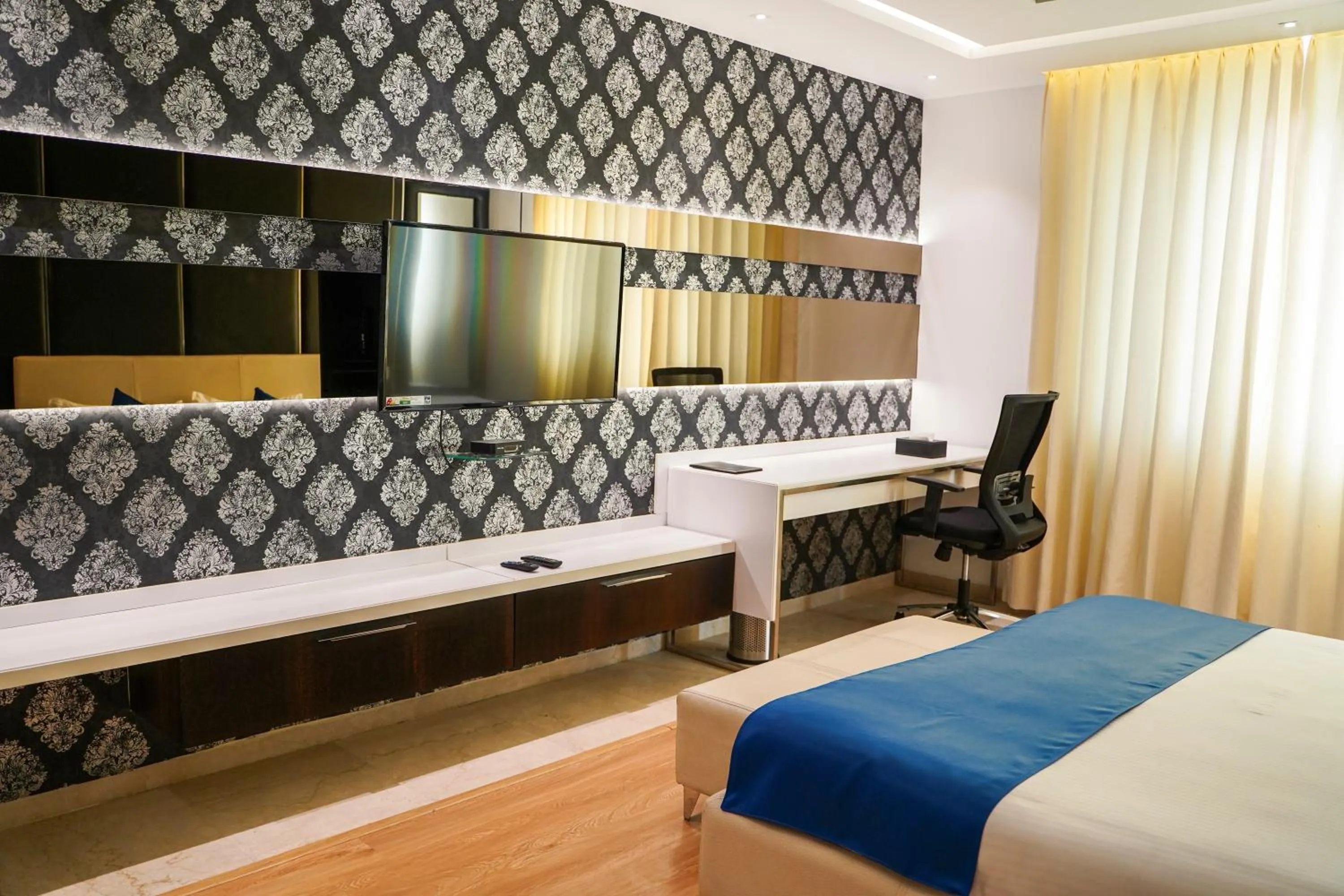 Bed in BNGV Grandeur Hotel & Banquets