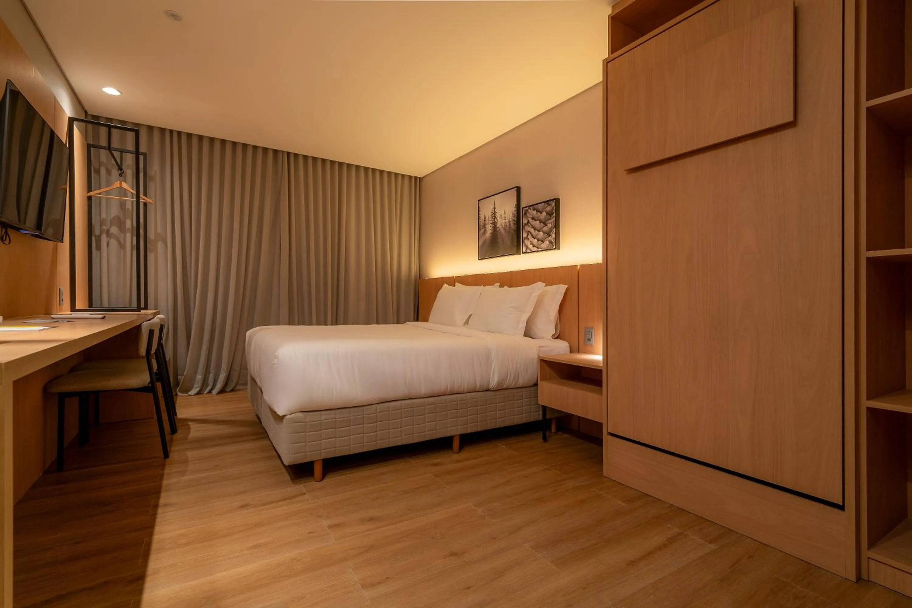 Photo of the whole room, Bed in Golden Tulip Canela OFICIAL