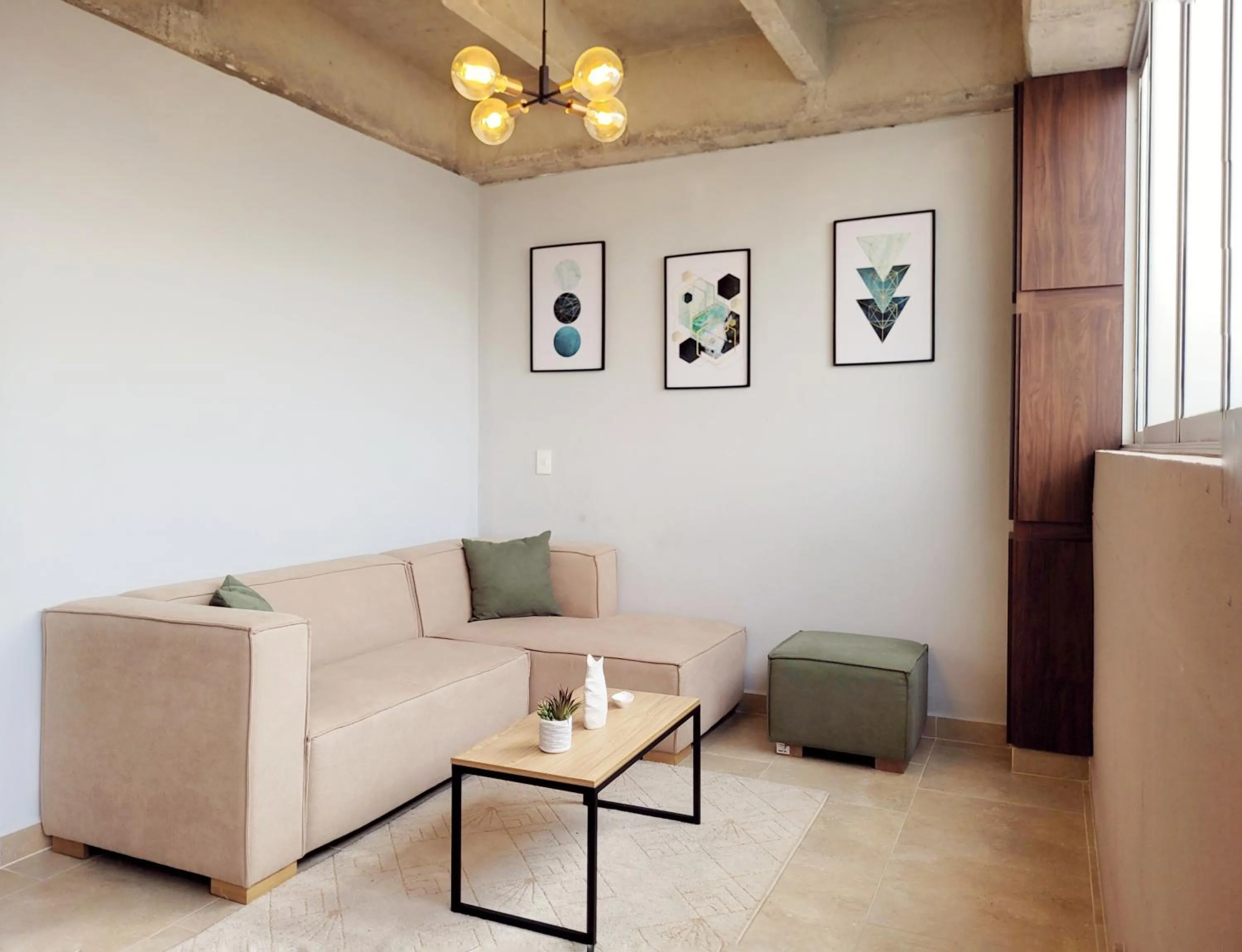 Living room in The Hub by Wynwood House