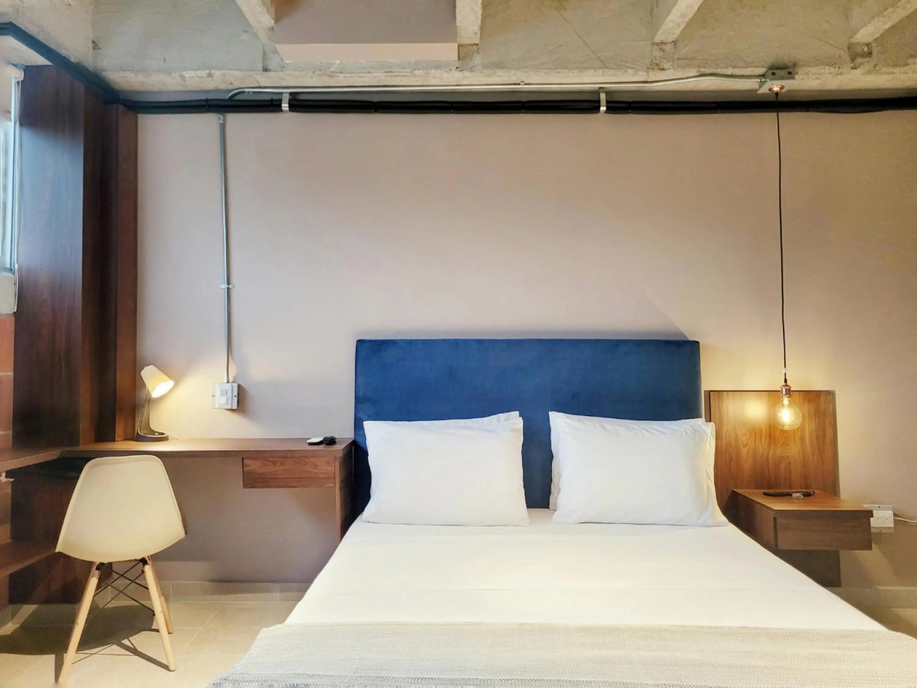 Bed in The Hub by Wynwood House