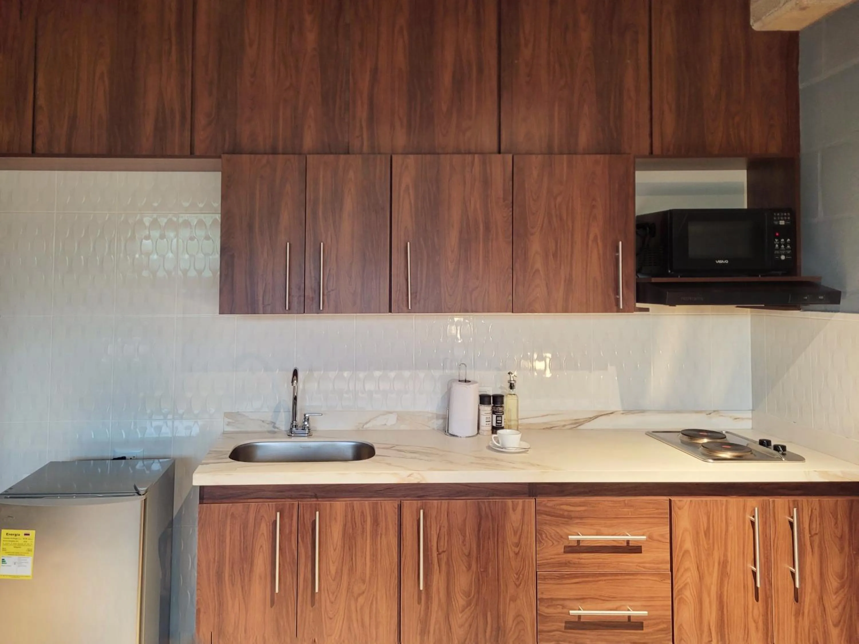 Kitchen or kitchenette in The Hub by Wynwood House