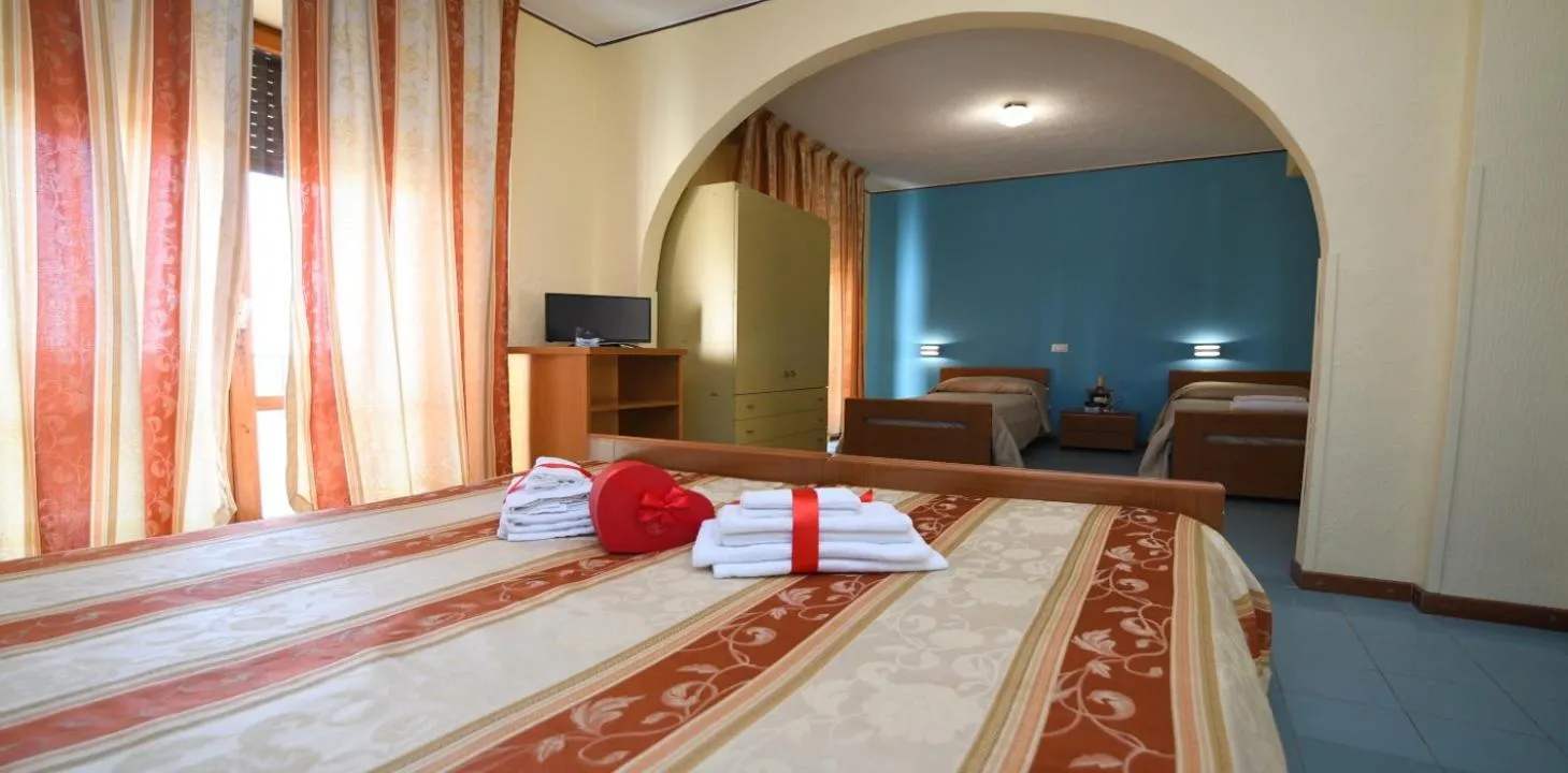 Photo of the whole room, Bed in International Resort