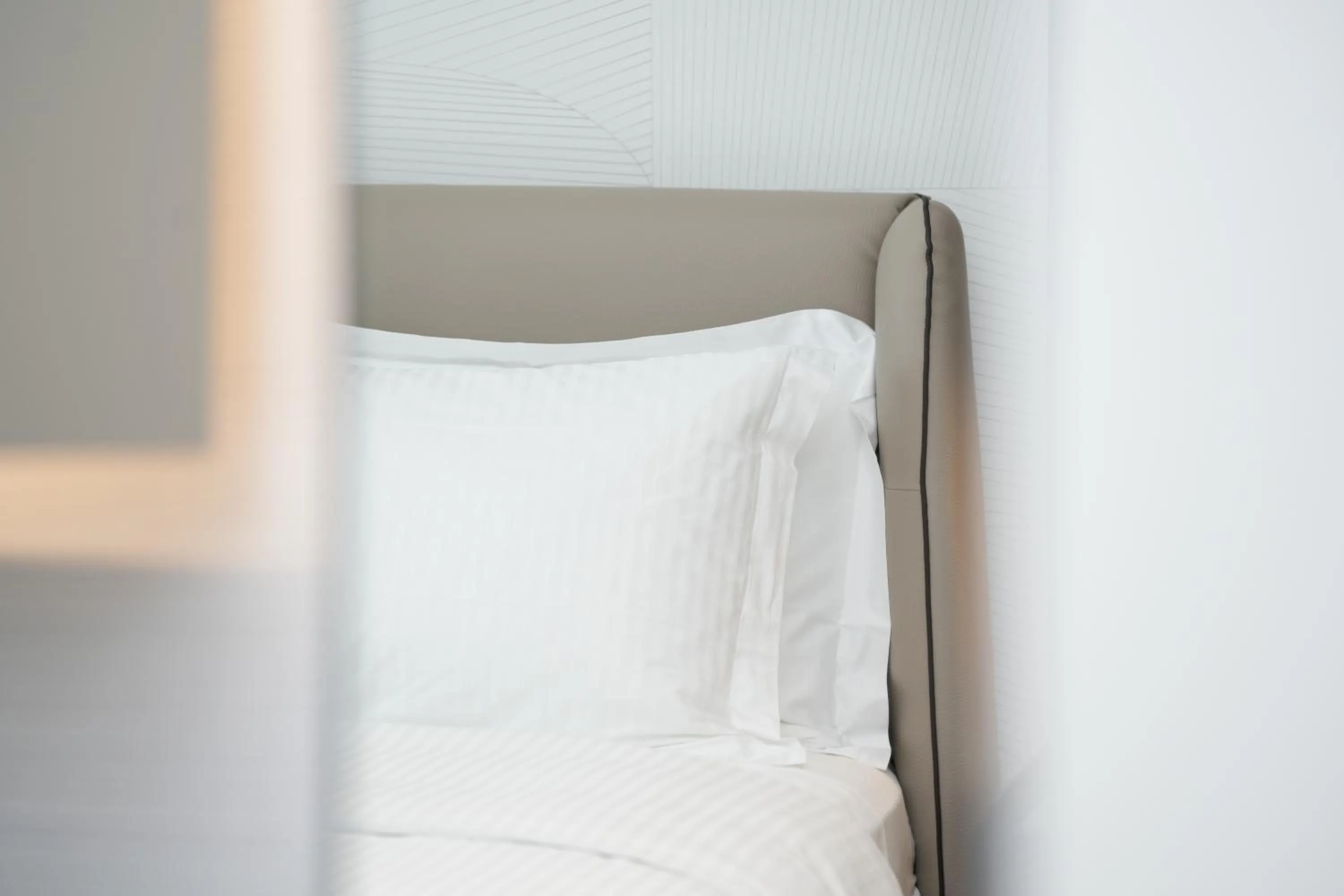 Bed in Magnus Hotel & SPA