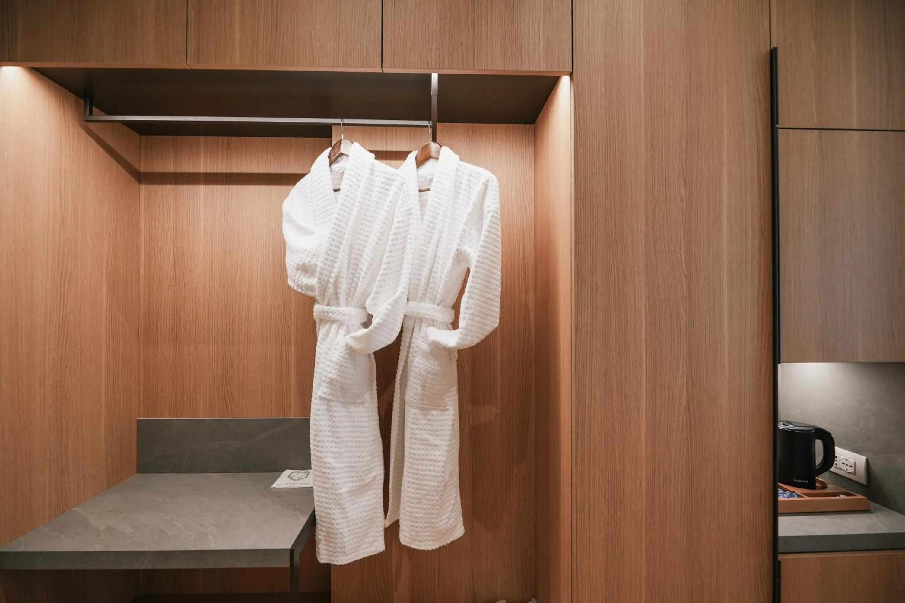 wardrobe in Magnus Hotel & SPA