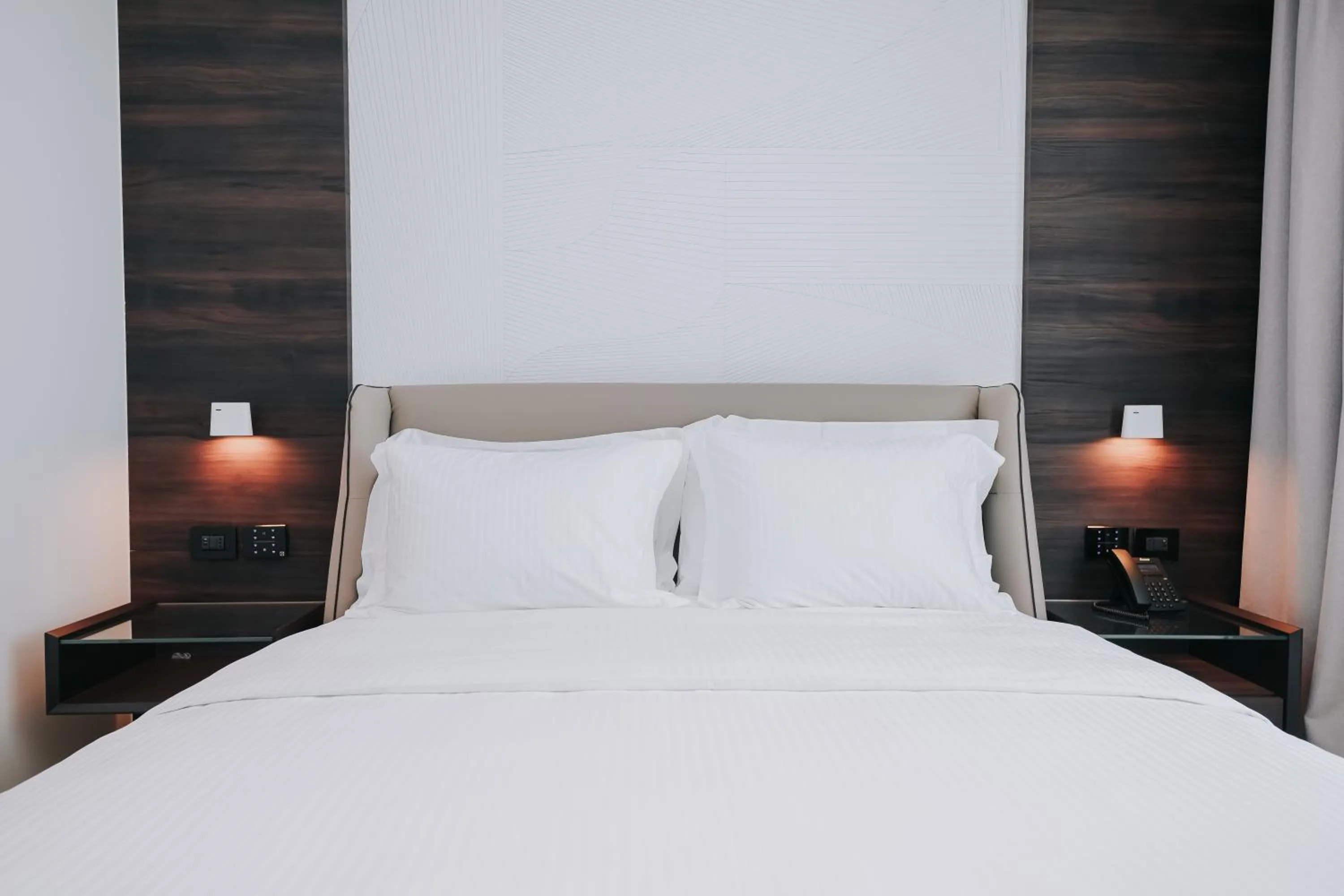Bed in Magnus Hotel & SPA