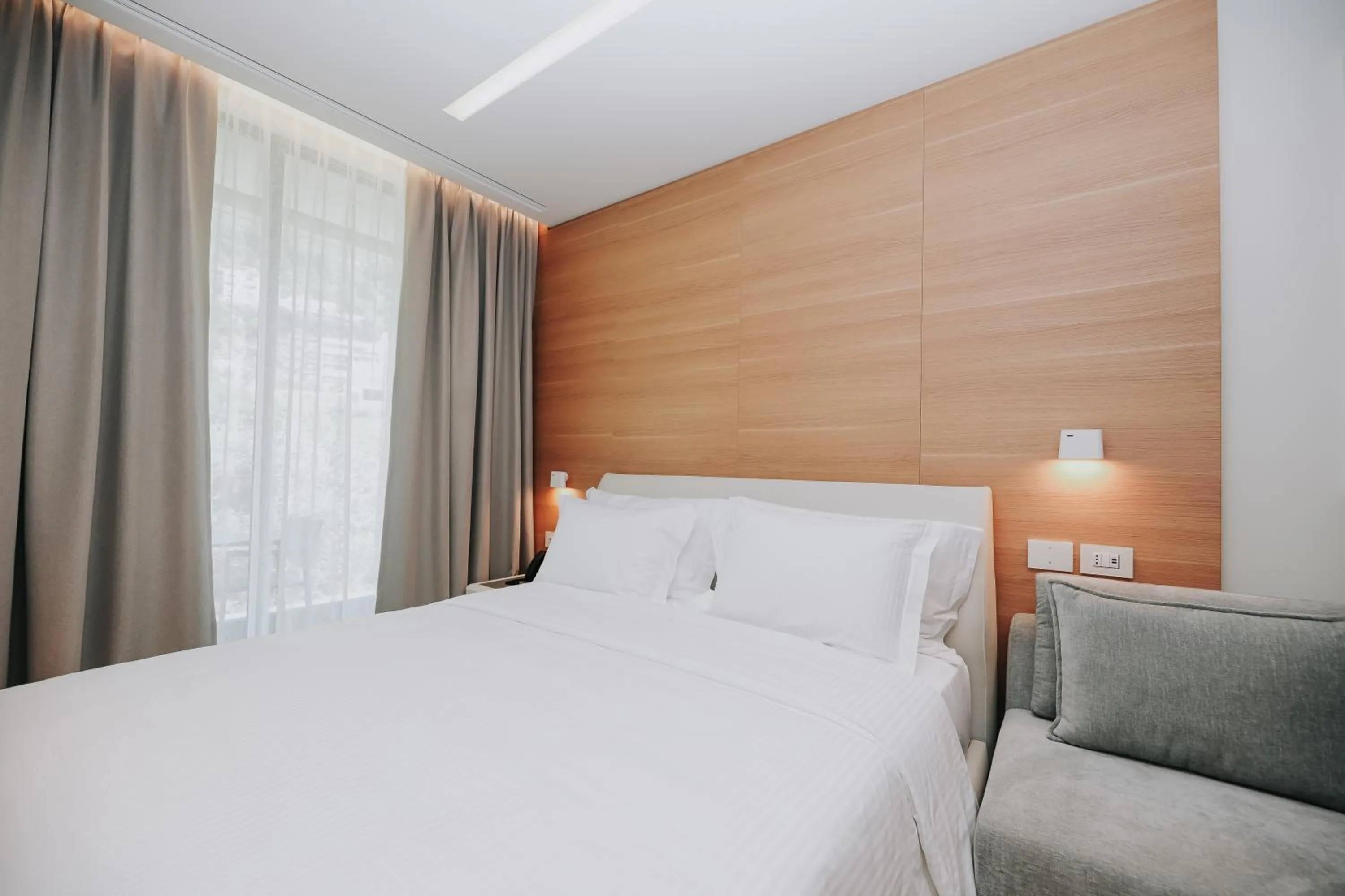 Bed in Magnus Hotel & SPA