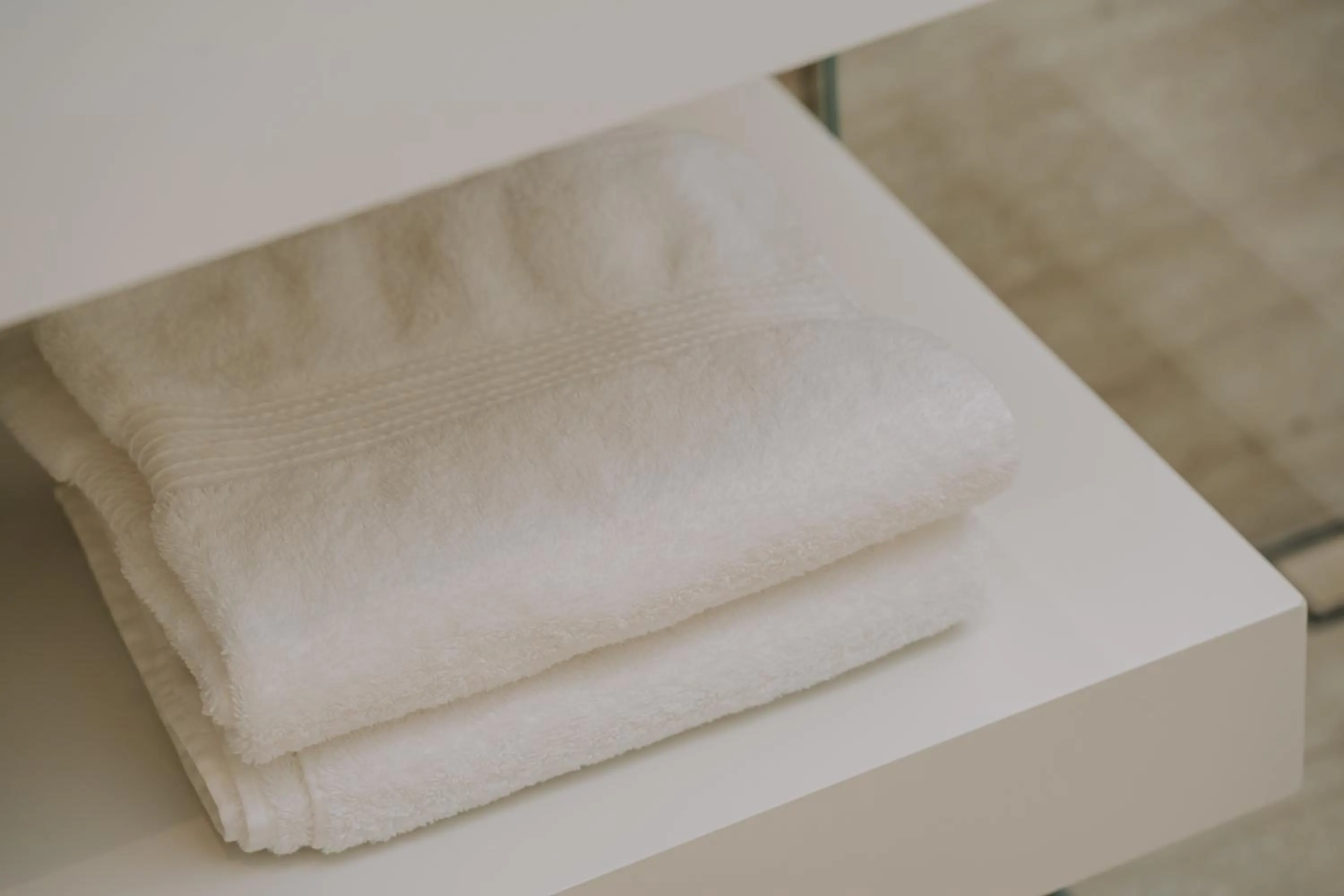 towels, Bed in Magnus Hotel & SPA