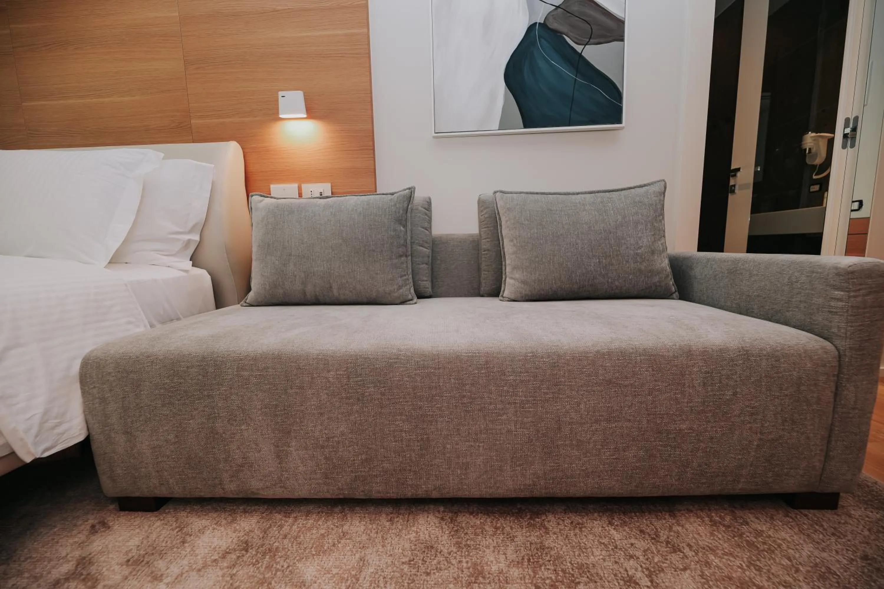 Seating area, Bed in Magnus Hotel & SPA