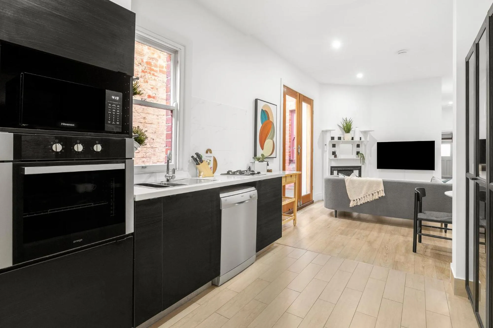 Kitchen or kitchenette in Simpson Street Apartments by Urban Rest