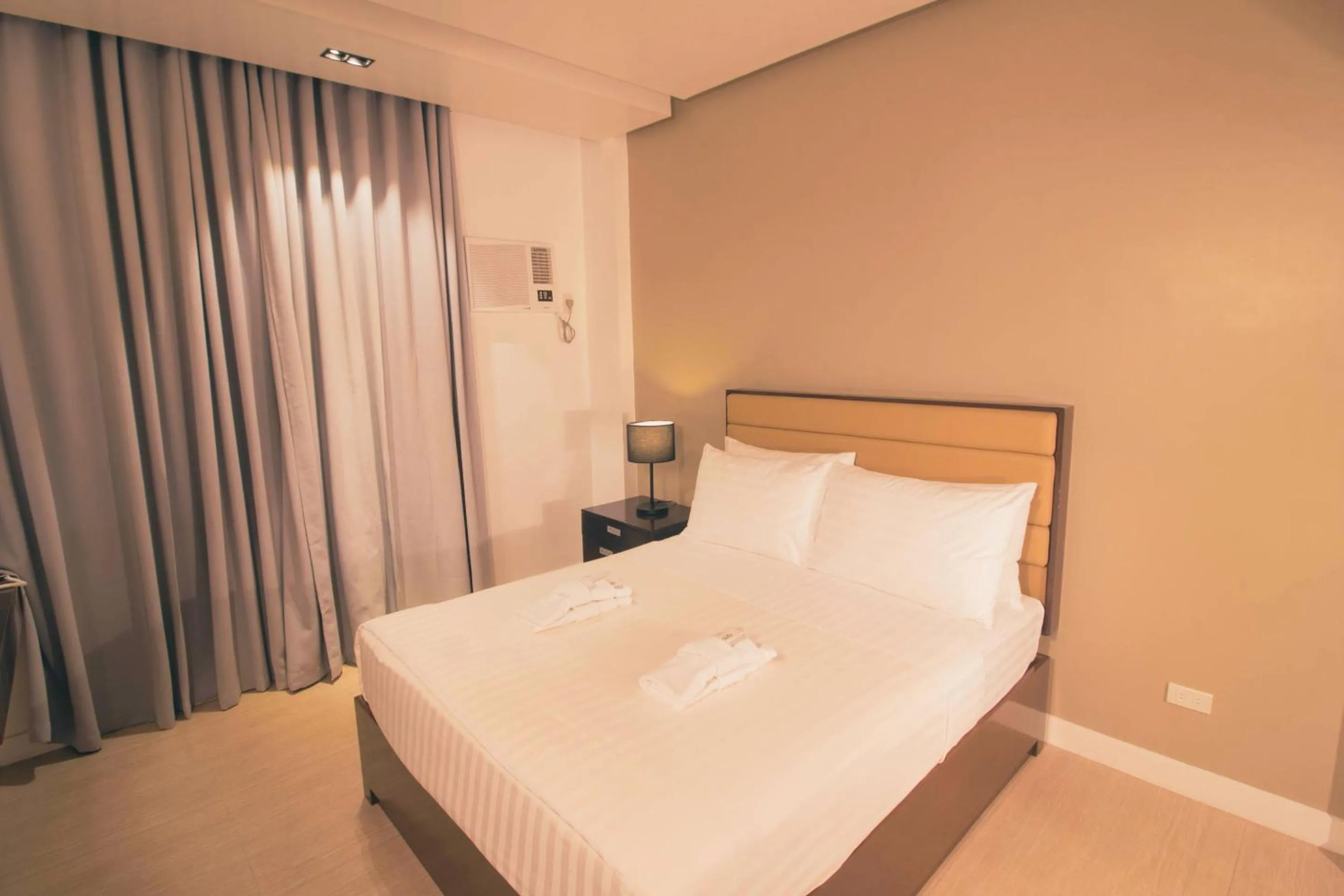 Bed in Aura Condotel