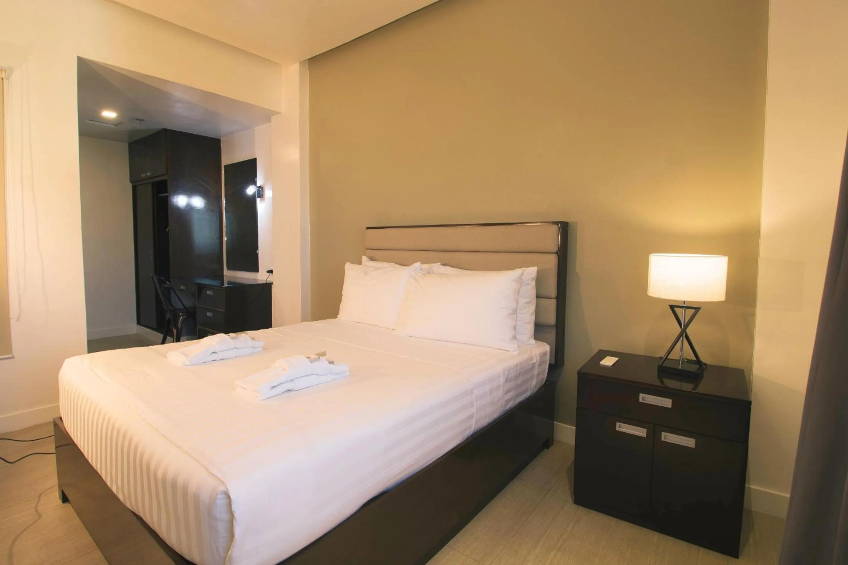 Bed in Aura Condotel