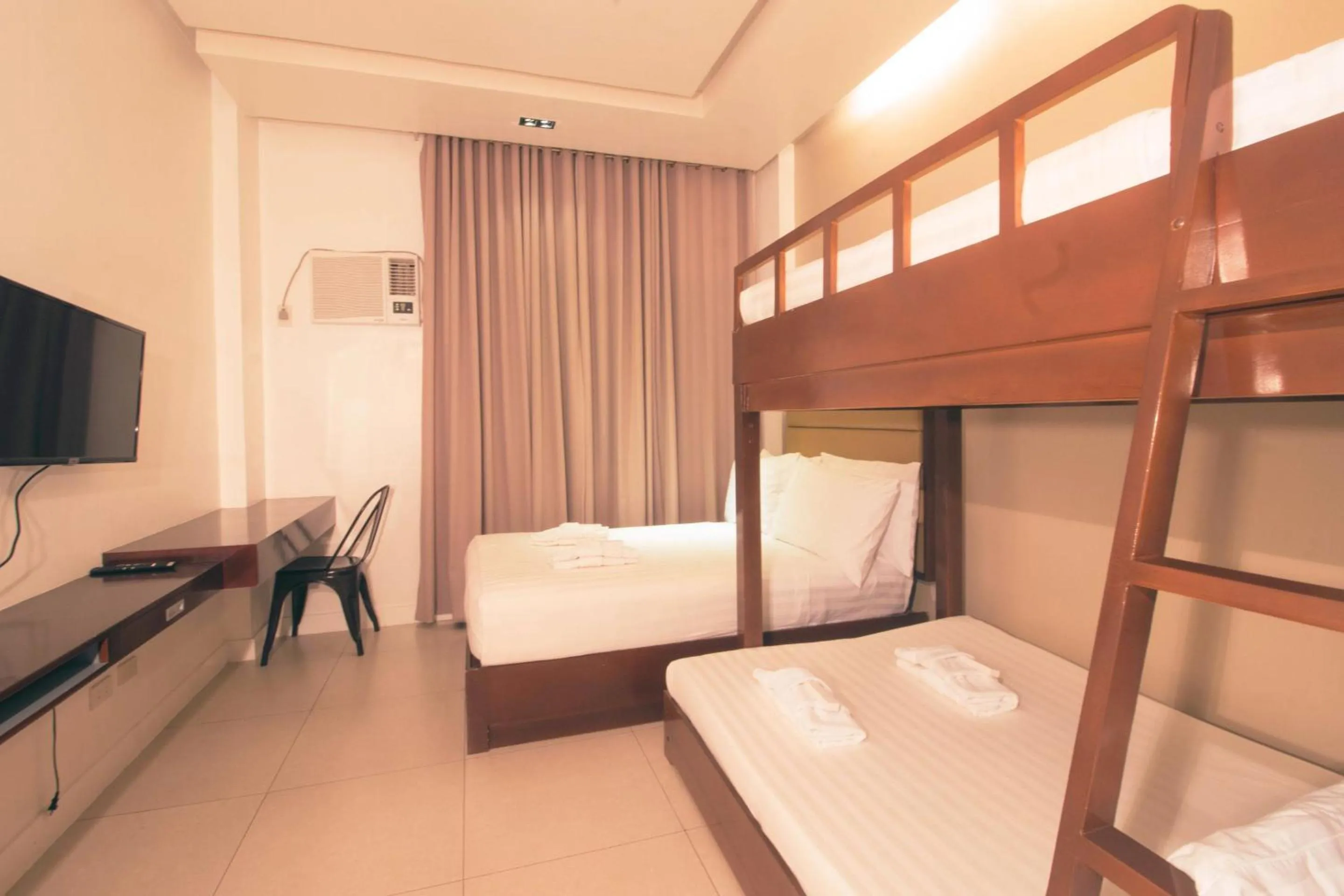 Bed in Aura Condotel