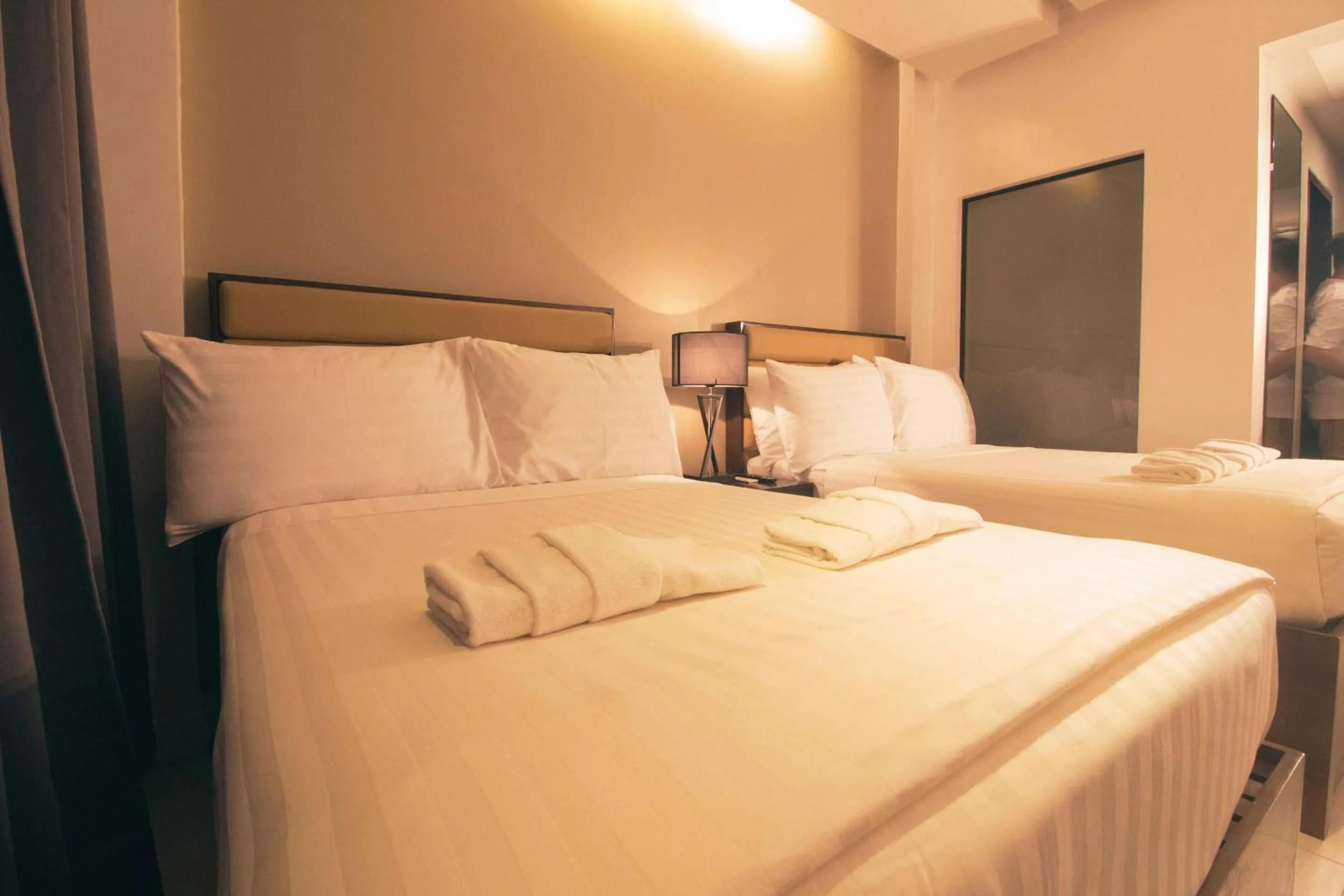Bed in Aura Condotel