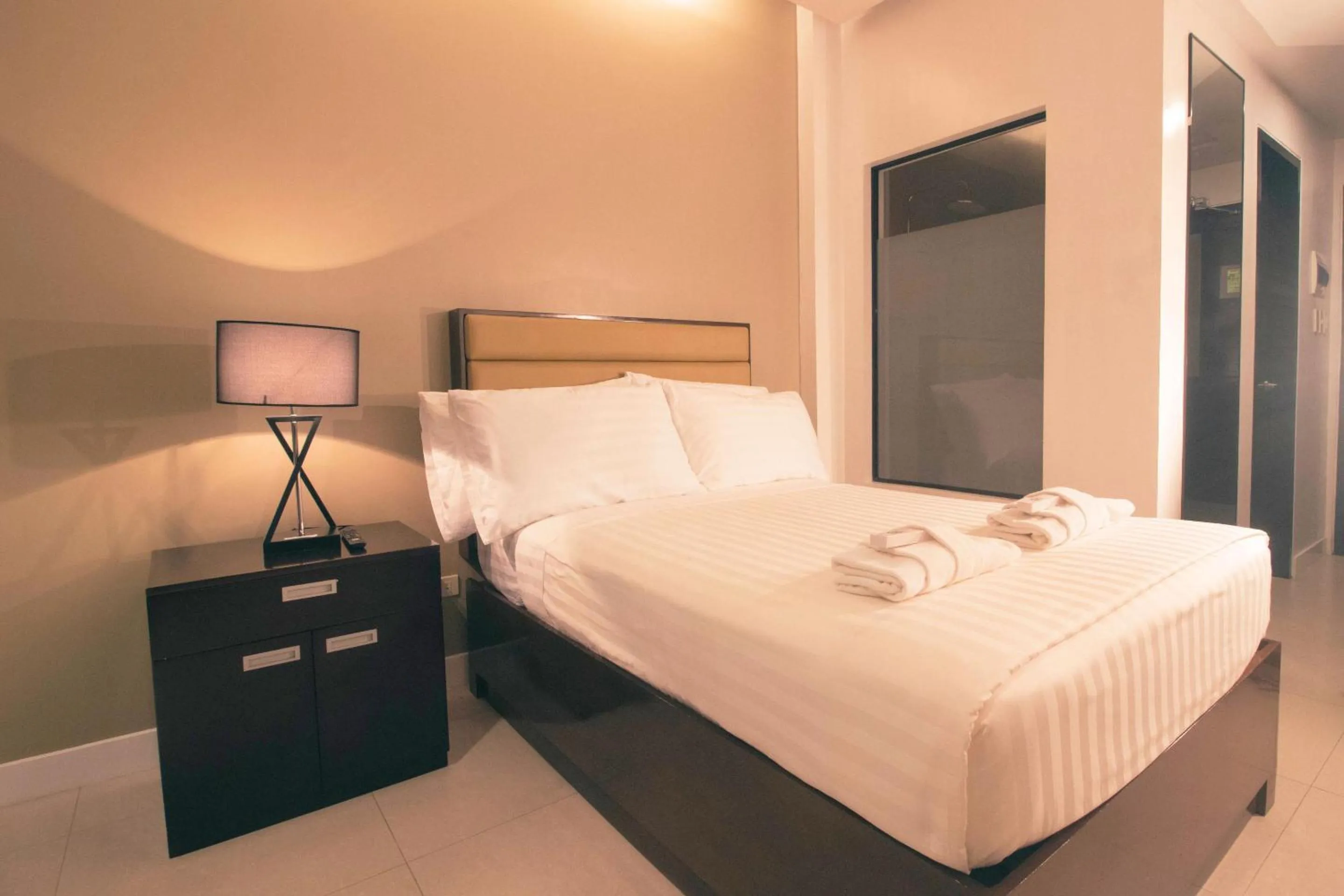 Bed in Aura Condotel