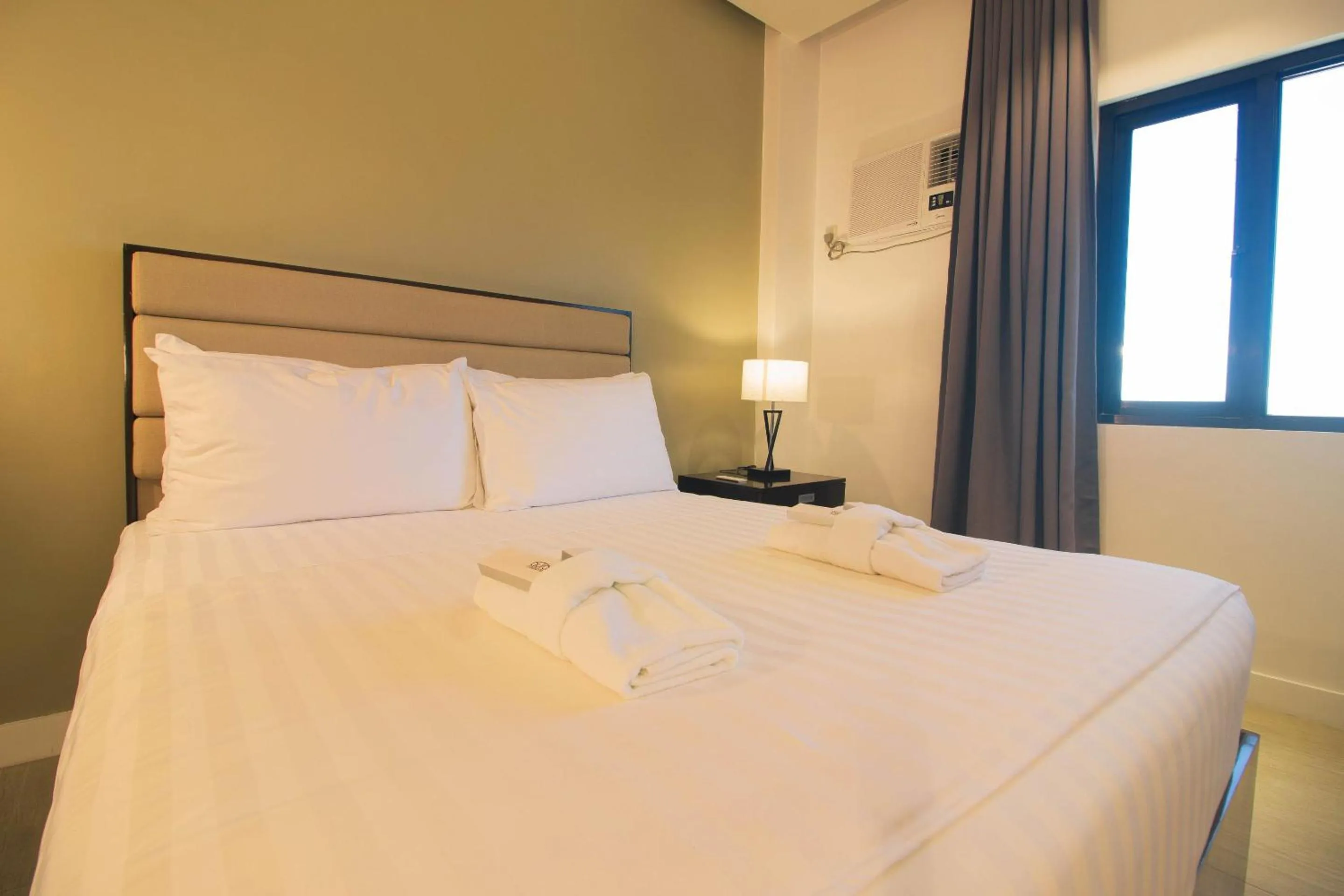 Bed in Aura Condotel