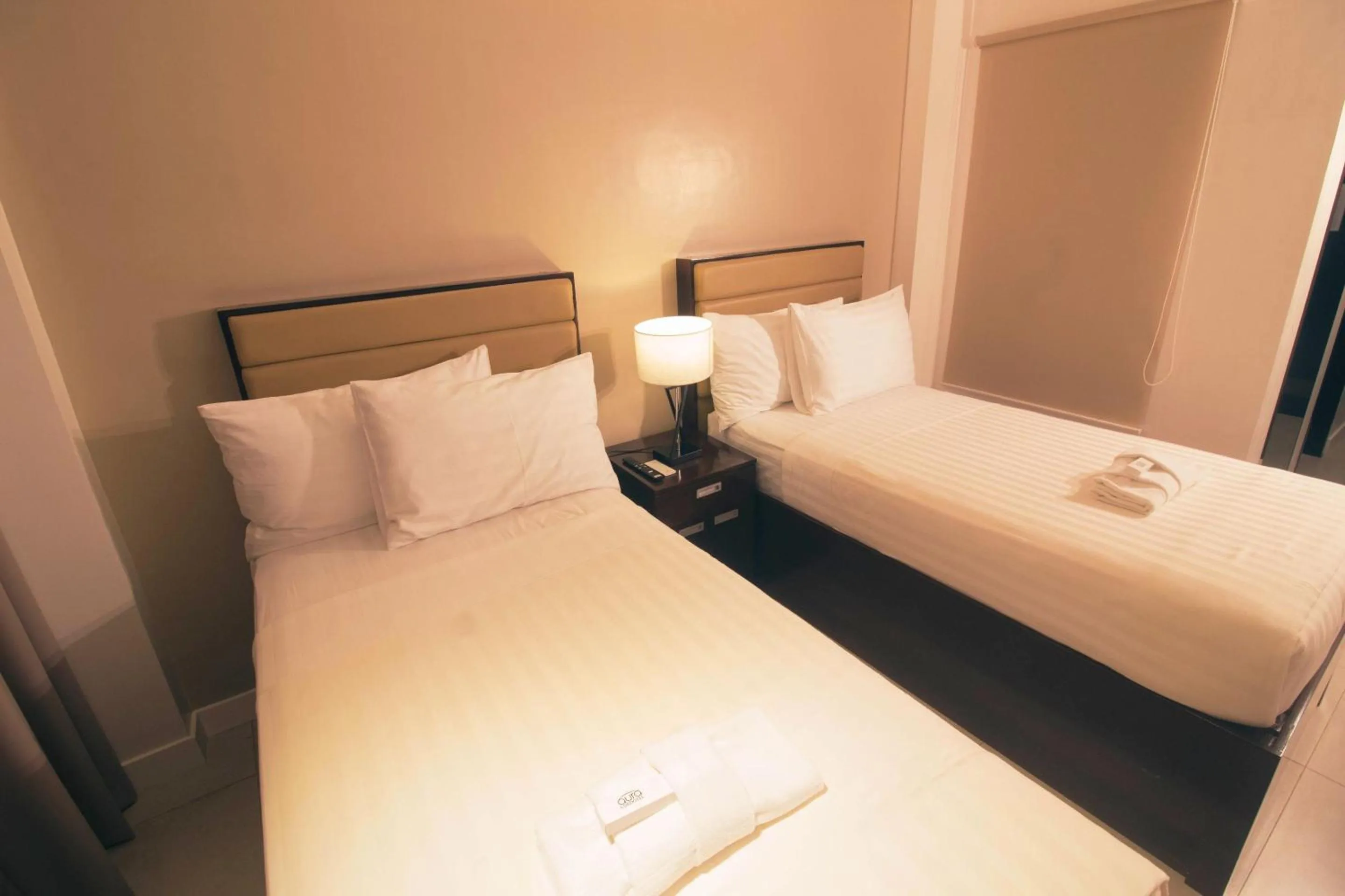 Bed in Aura Condotel