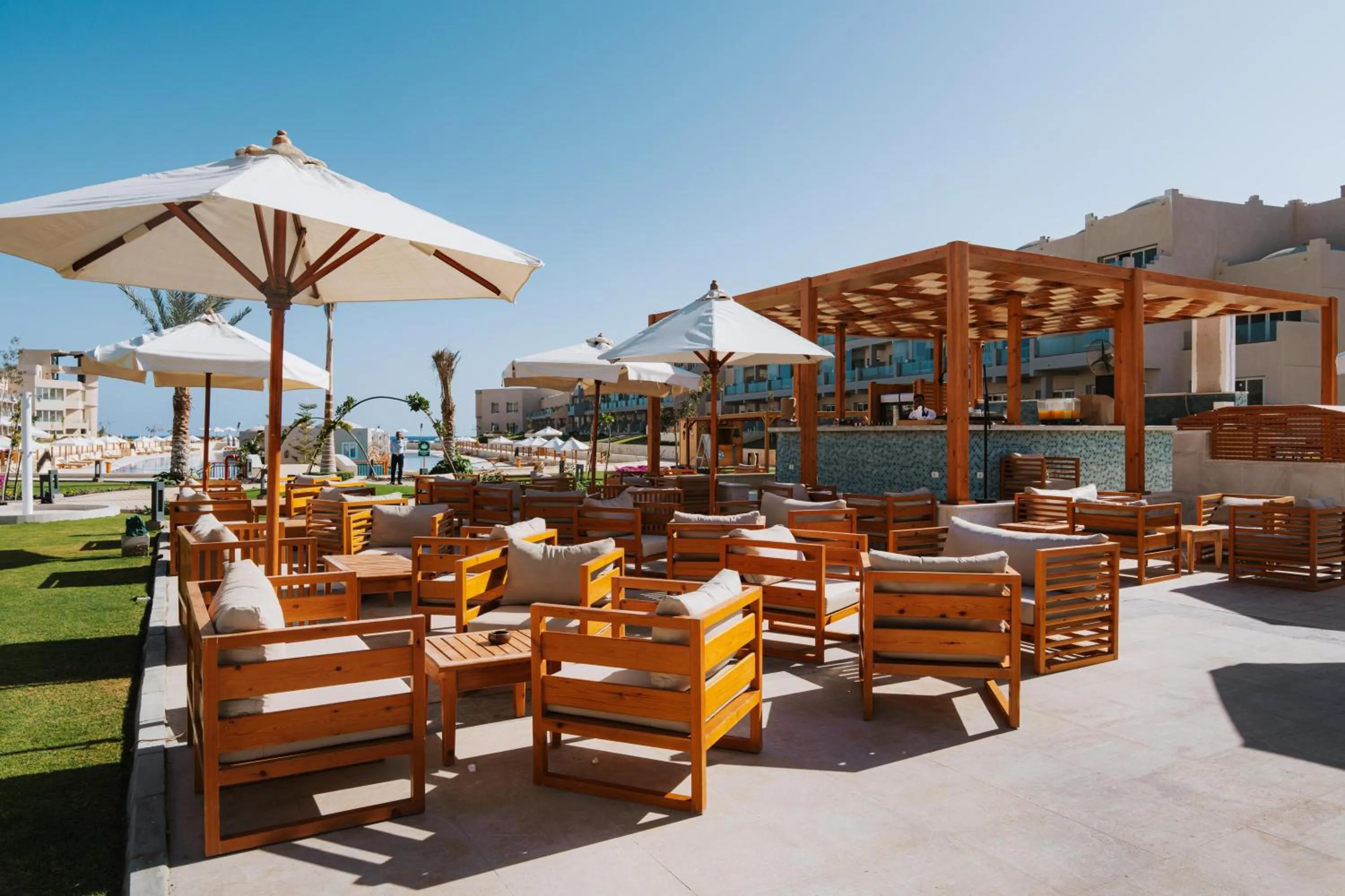 Lounge or bar in Diamond Beach by Pearl Resorts