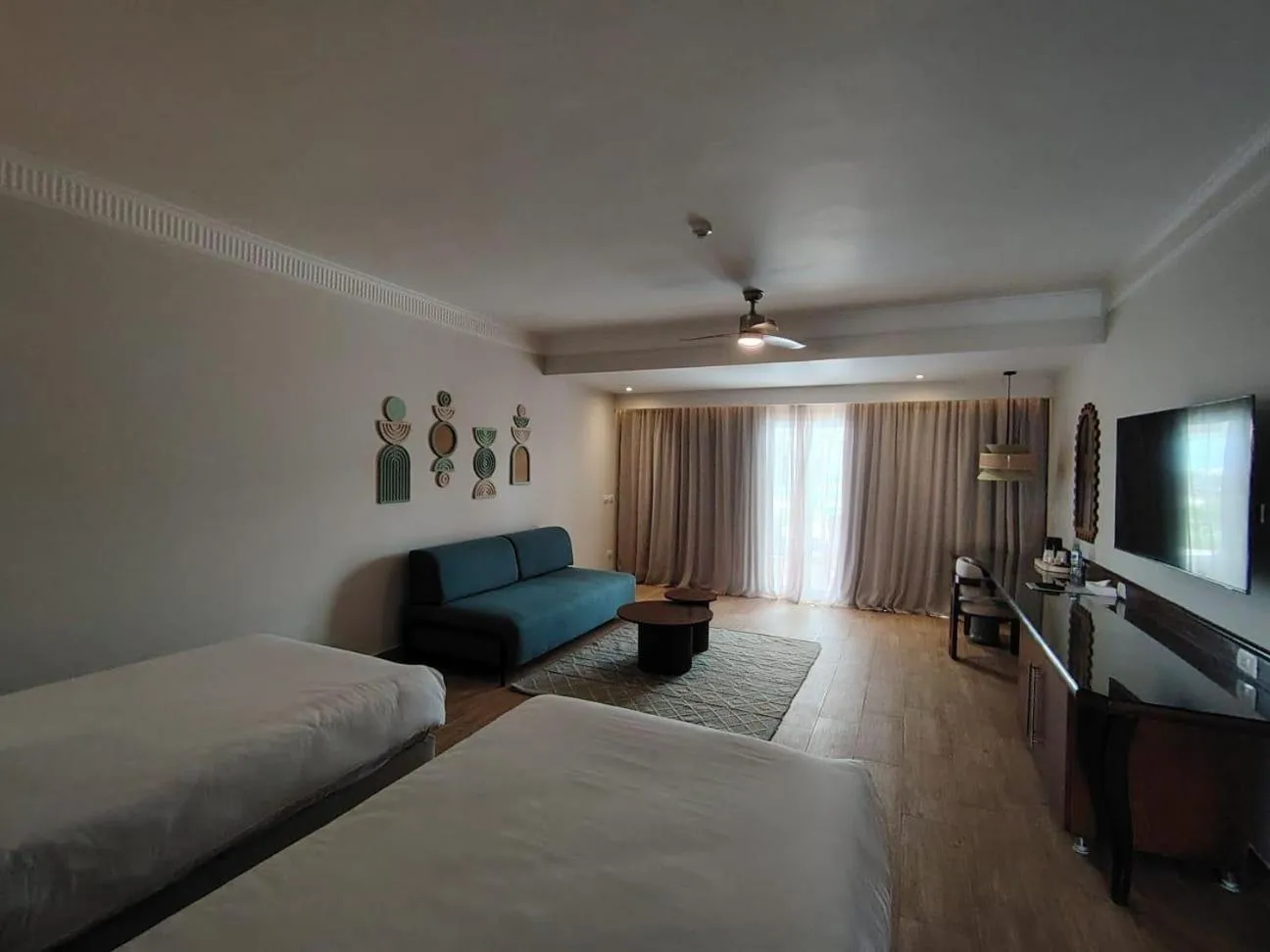Photo of the whole room, Bed in Diamond Beach by Pearl Resorts