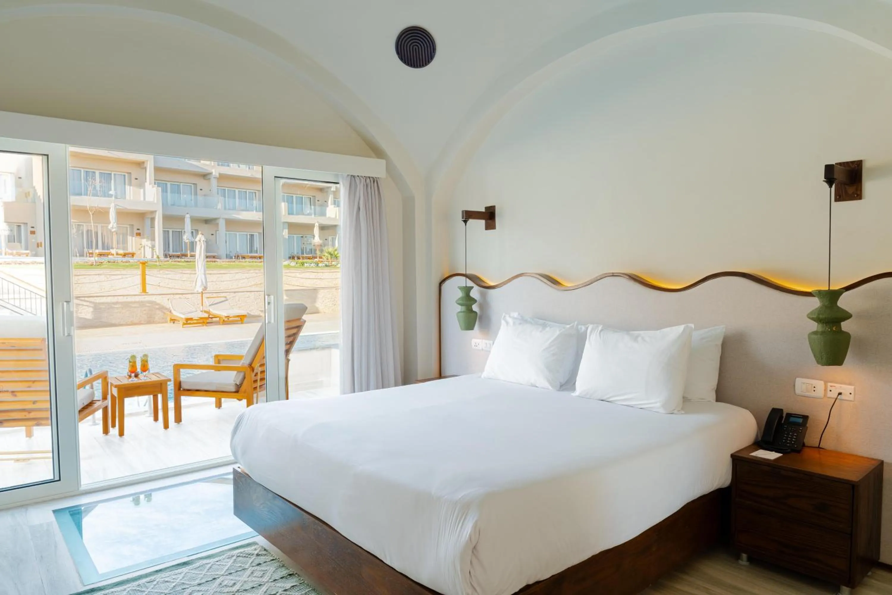 Photo of the whole room, Bed in Diamond Beach by Pearl Resorts