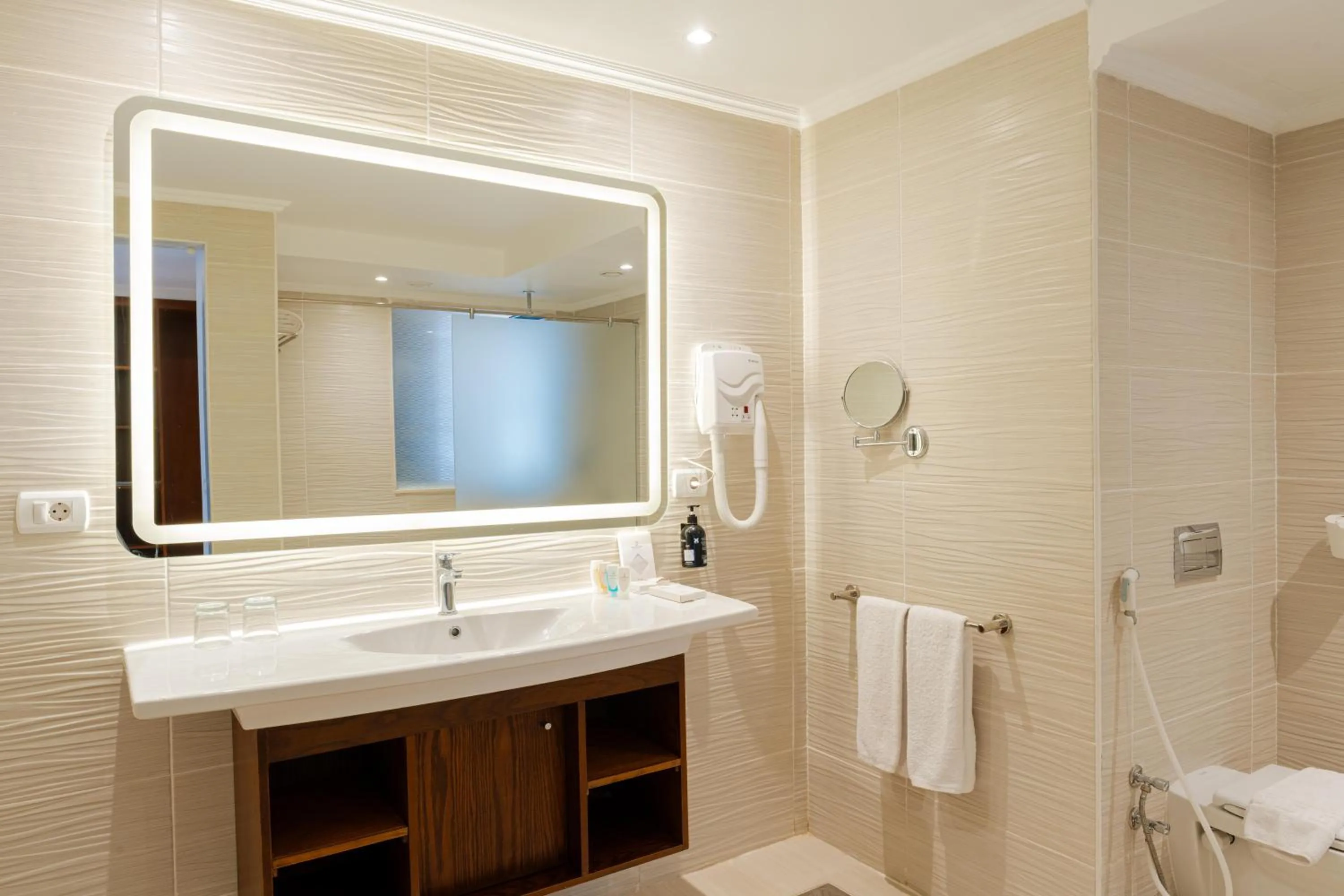 Bathroom in Diamond Beach by Pearl Resorts