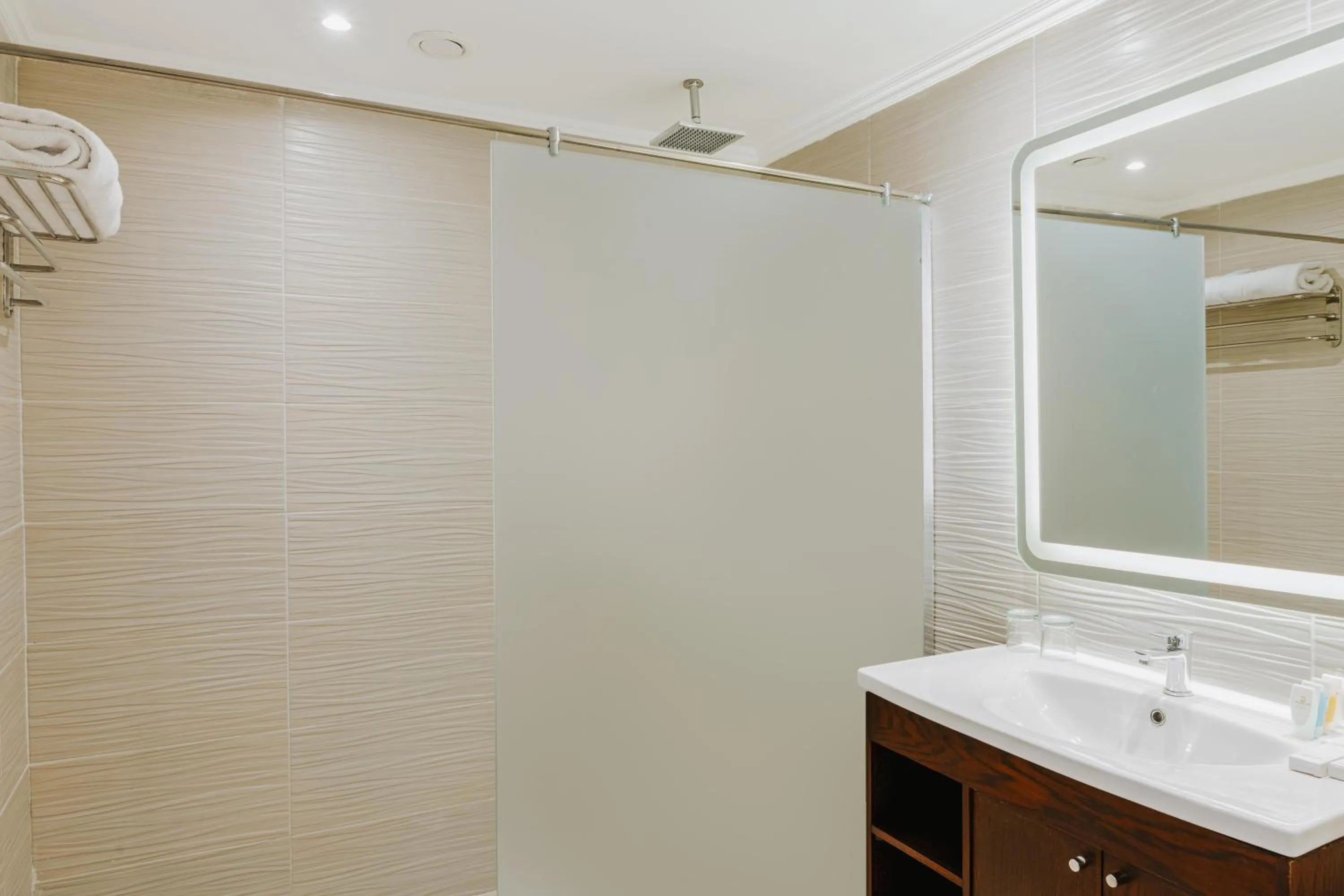 Bathroom in Diamond Beach by Pearl Resorts