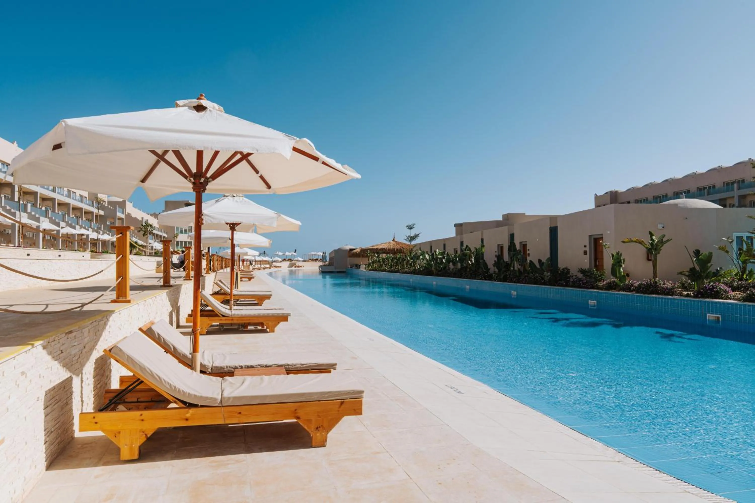 Swimming pool in Diamond Beach by Pearl Resorts