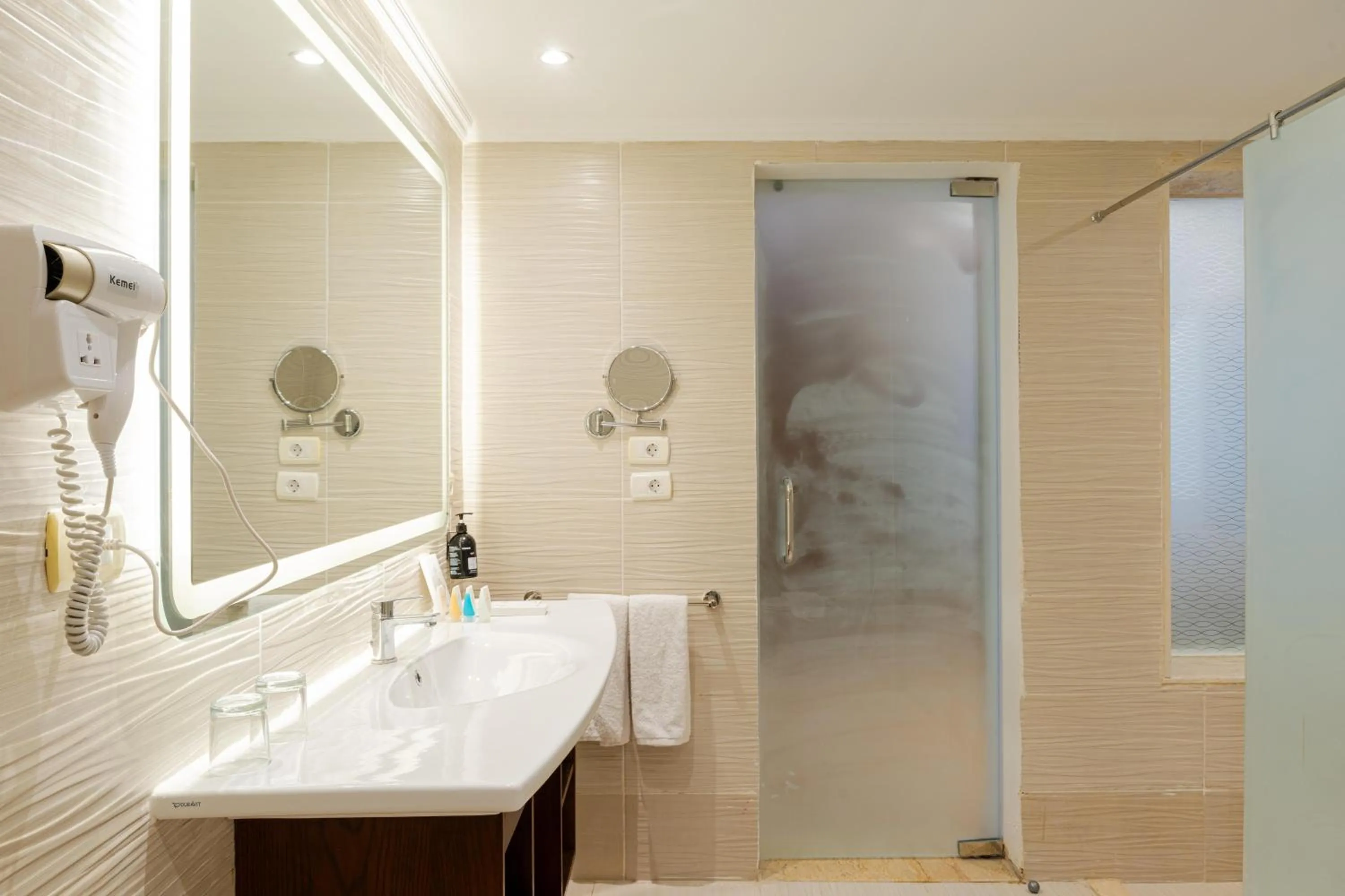 Bathroom in Diamond Beach by Pearl Resorts