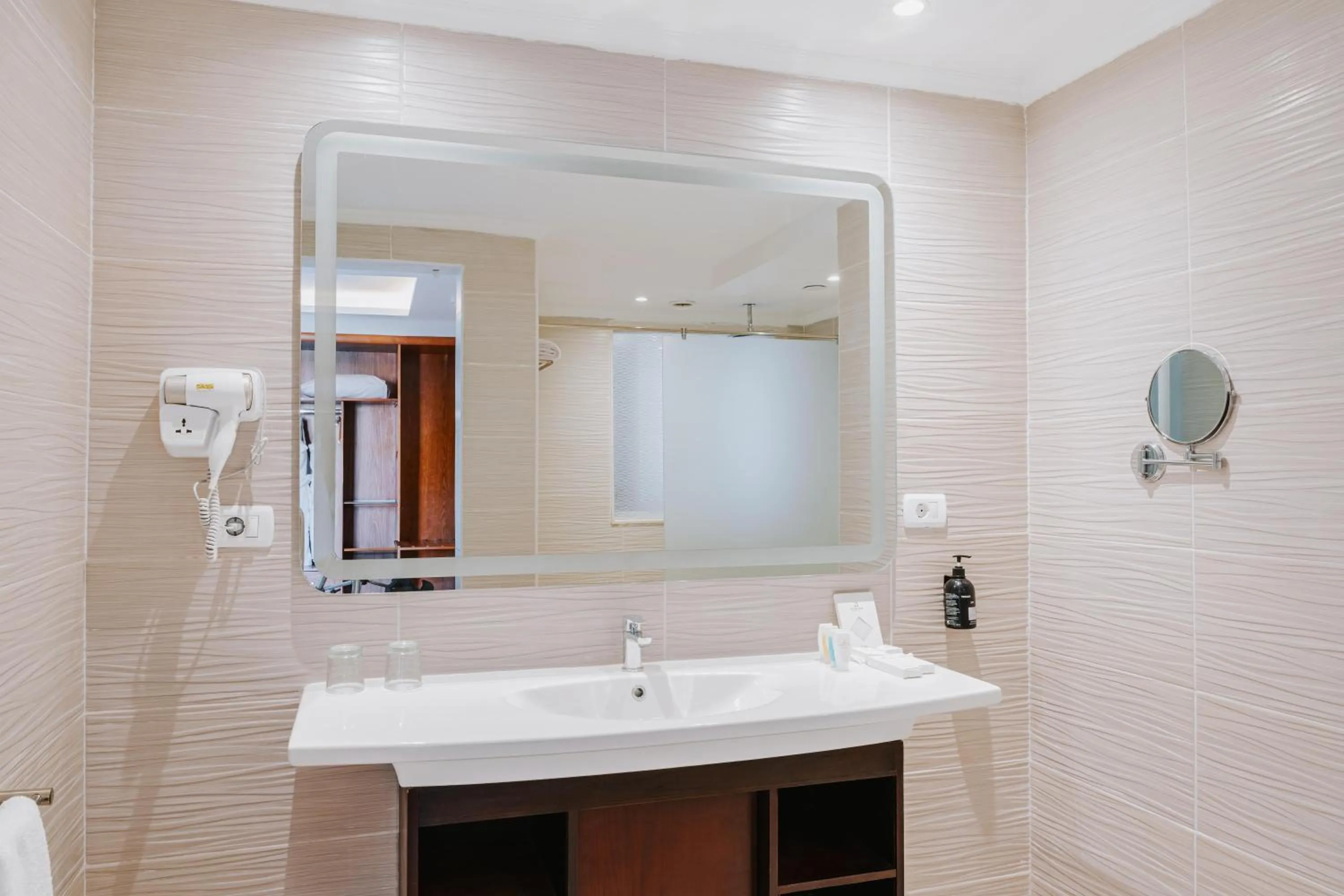 Bathroom in Diamond Beach by Pearl Resorts