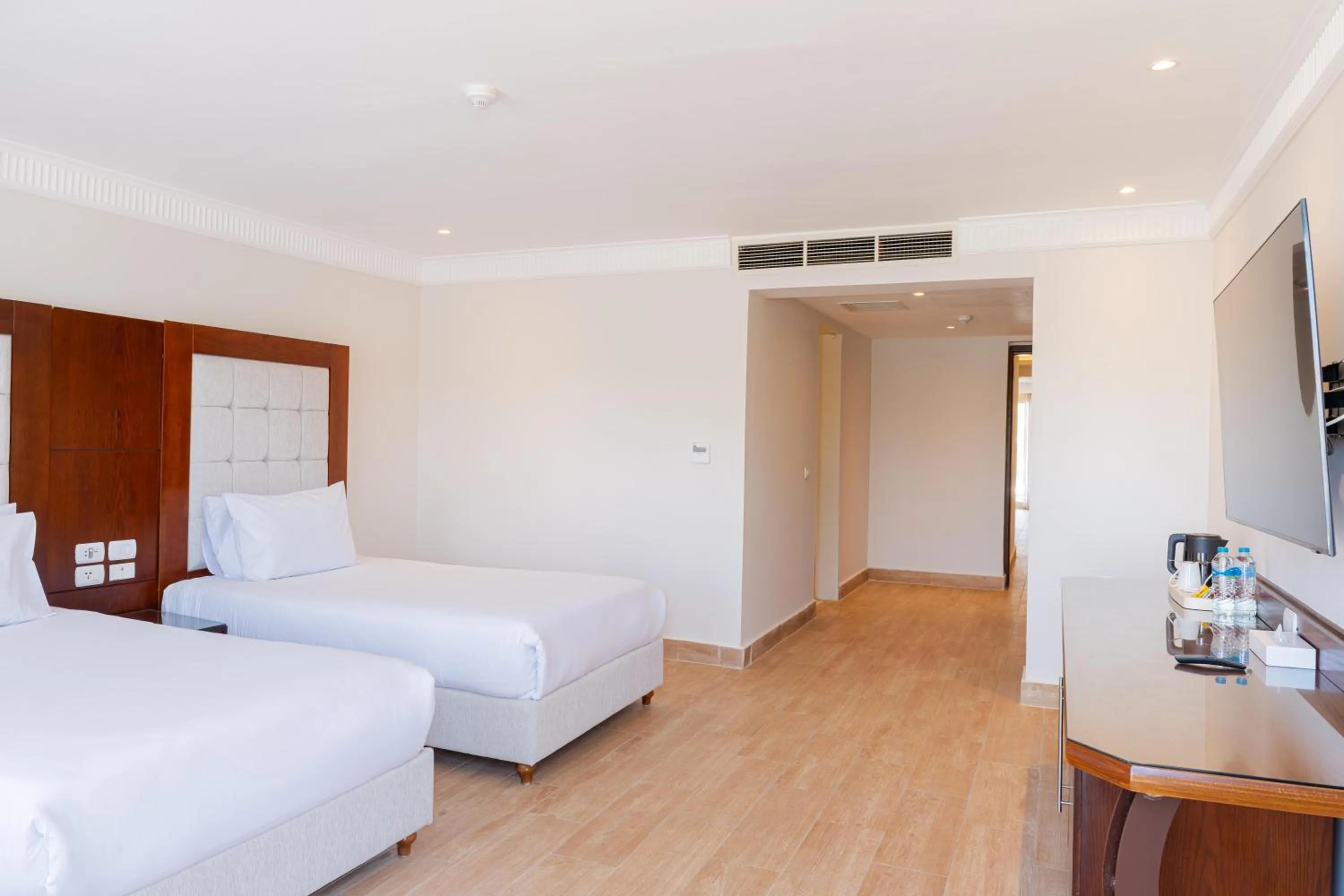 Photo of the whole room, Bed in Diamond Beach by Pearl Resorts