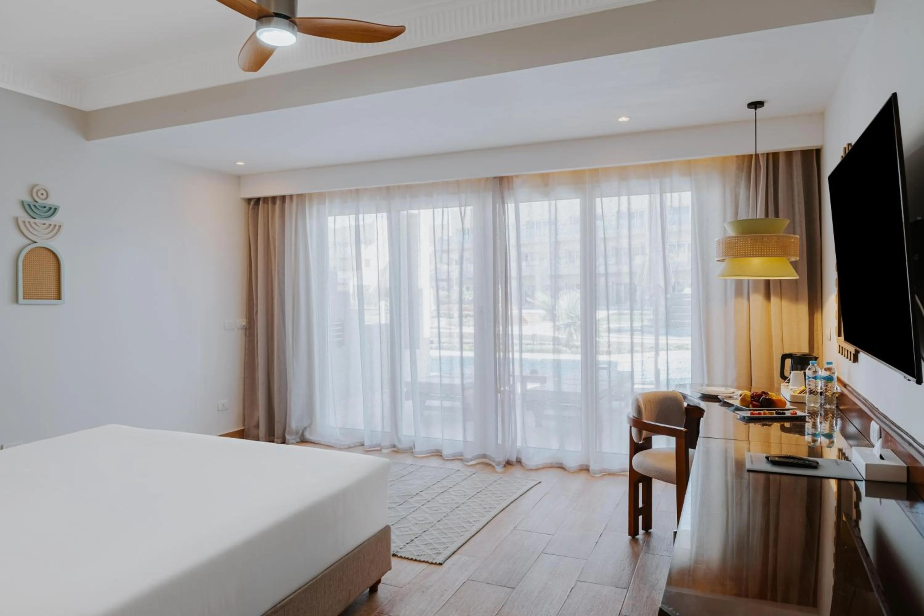 Photo of the whole room, Bed in Diamond Beach by Pearl Resorts