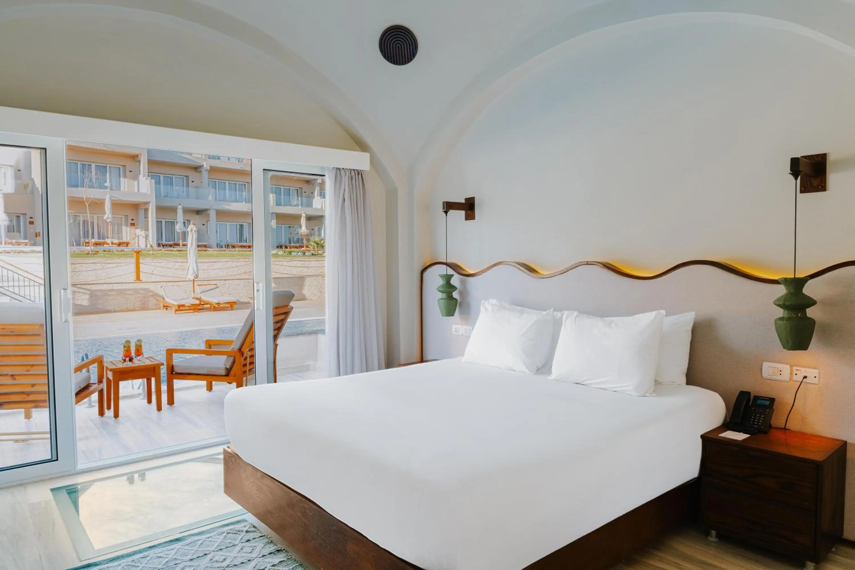 Photo of the whole room, Bed in Diamond Beach by Pearl Resorts