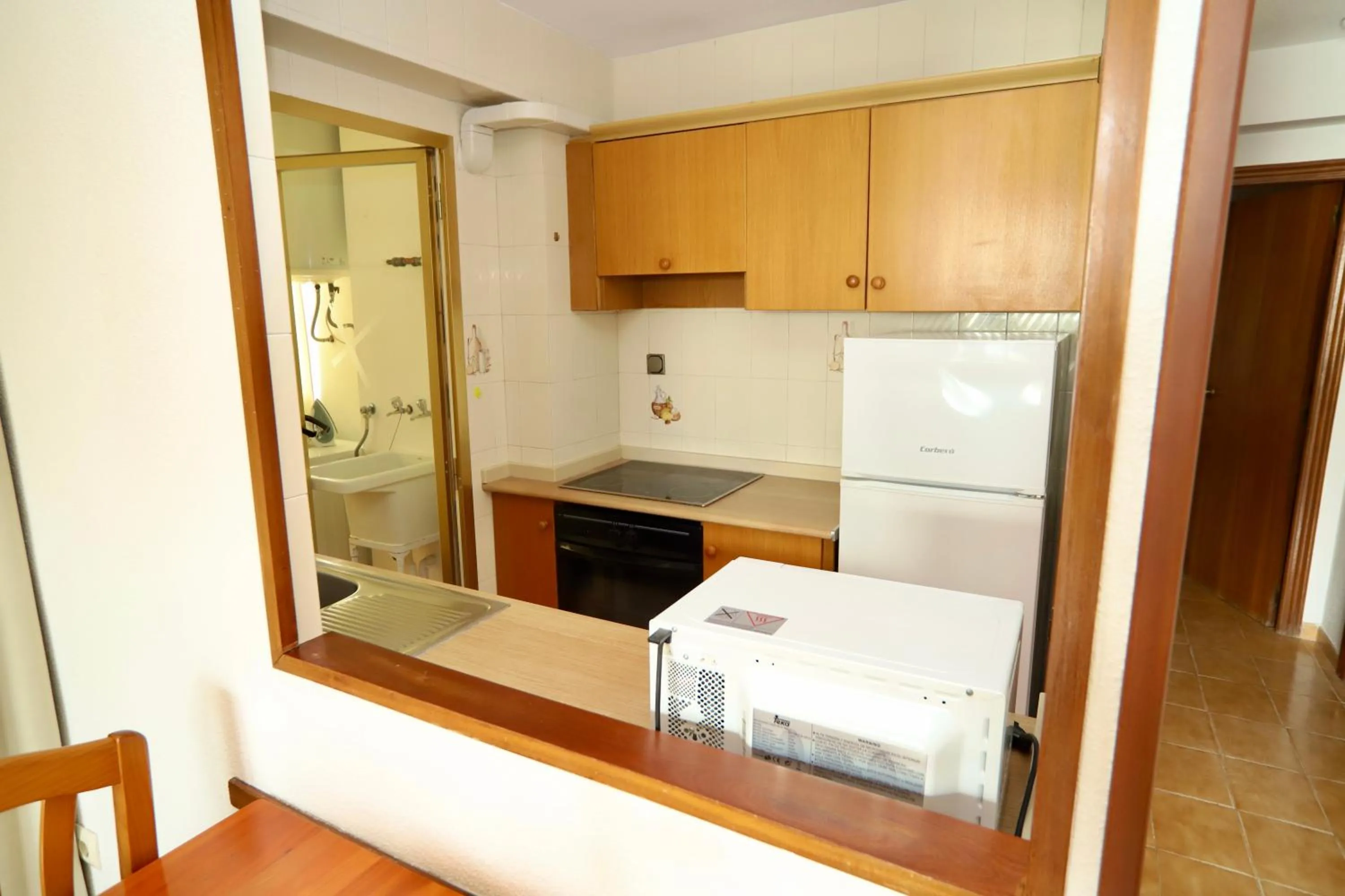 Kitchen or kitchenette in Apartamentos Torre Gerona