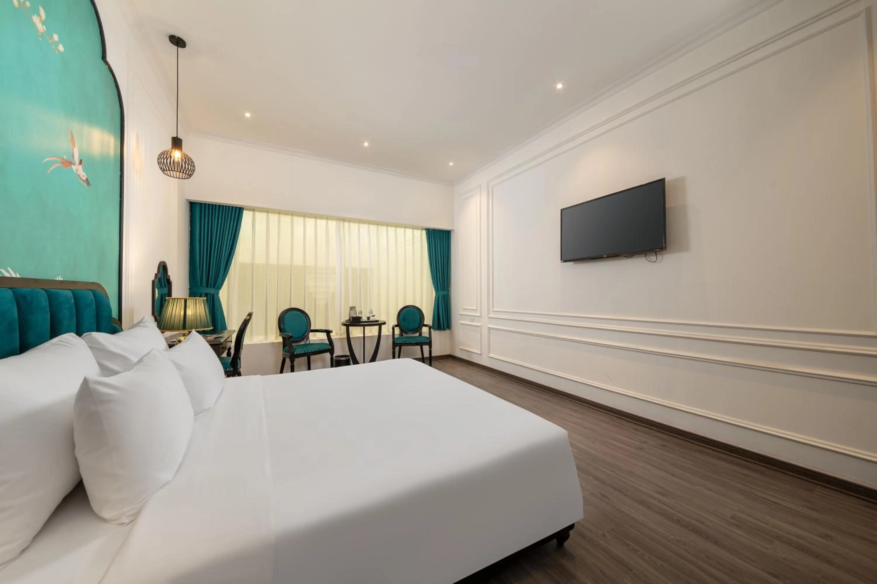 Communal lounge/ TV room, Bed in Azen Lakeside Hotel & Travel