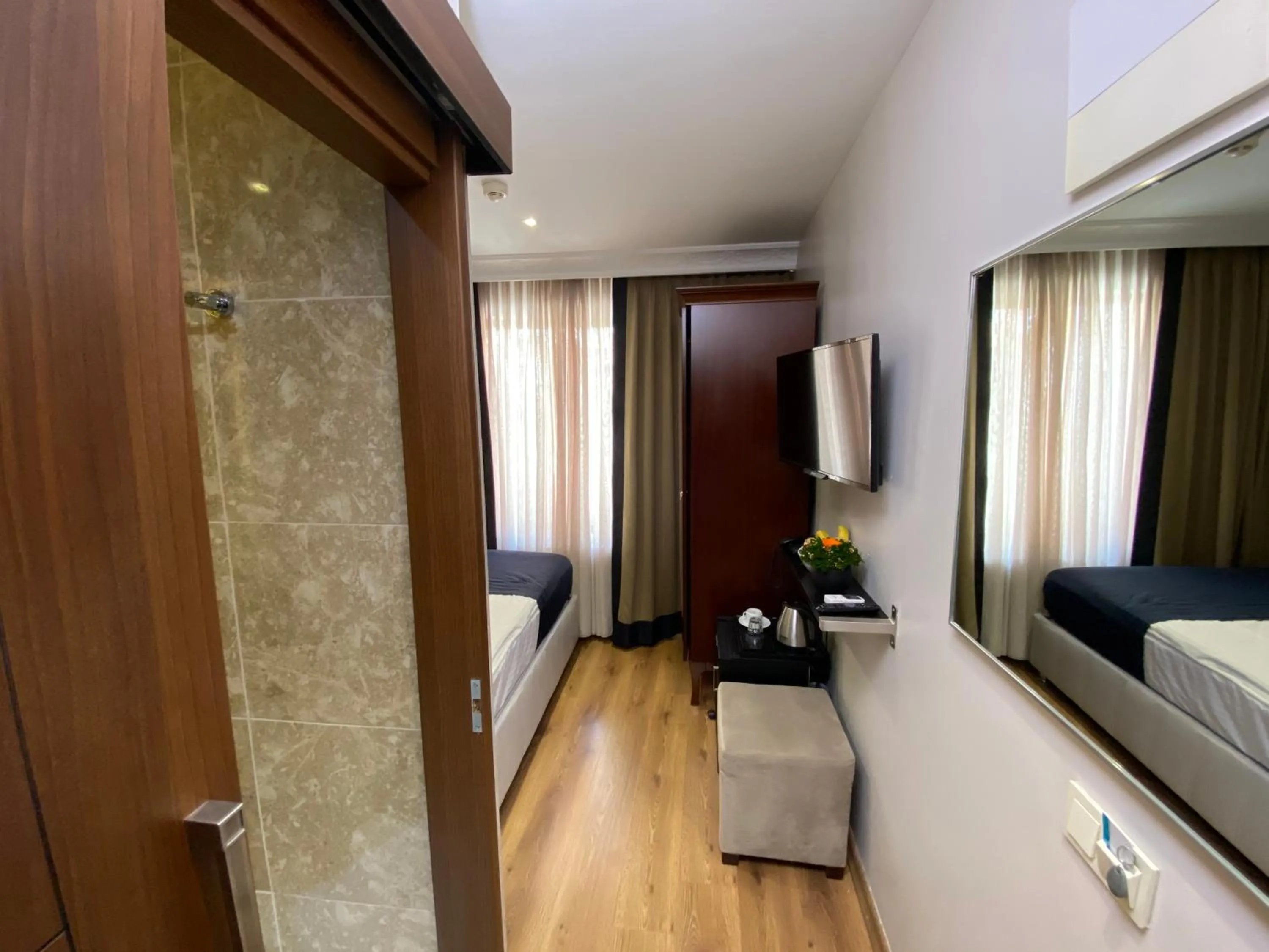 TV and multimedia, Bed in Four Doors Hotel