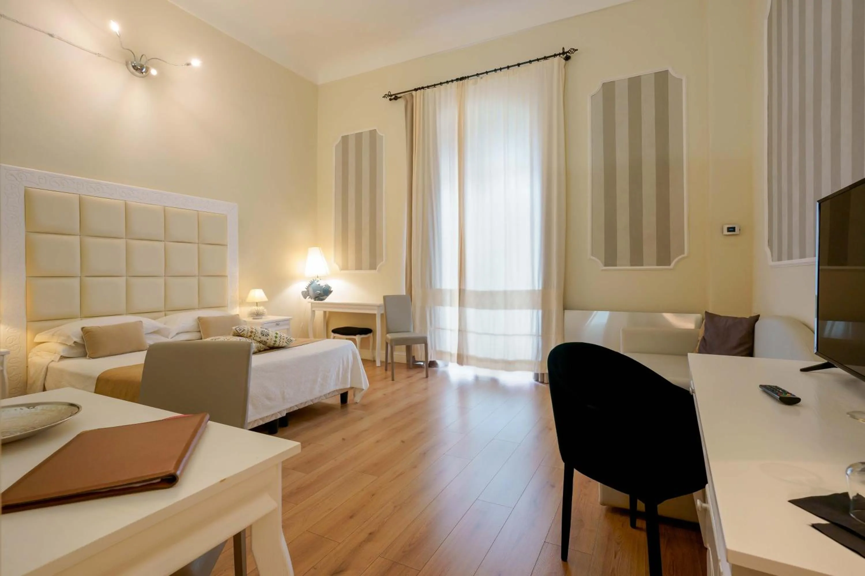 Photo of the whole room, Bed in Palazzo Pischedda