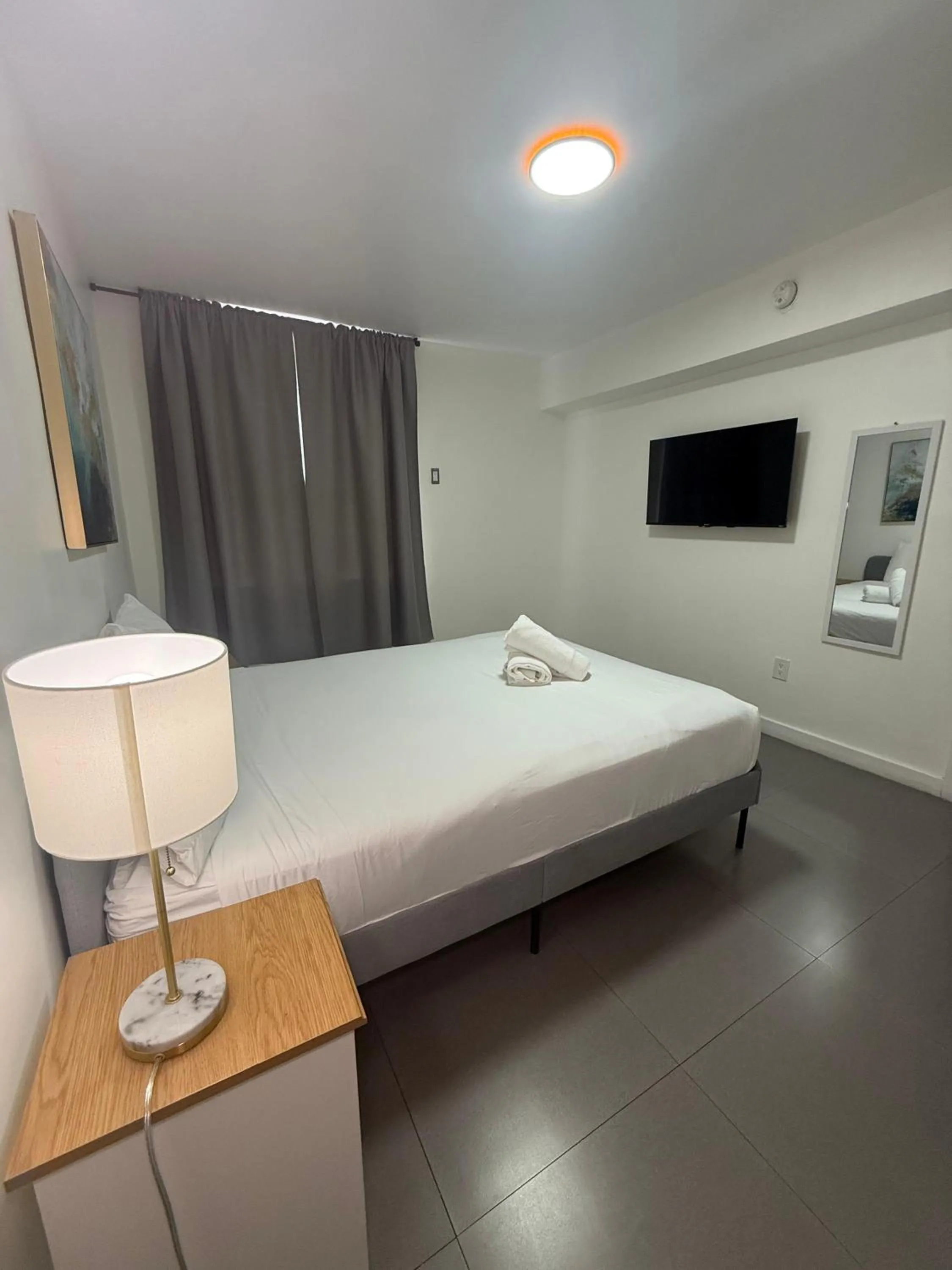 Bed in Wynwood Bungalows By Renzzi