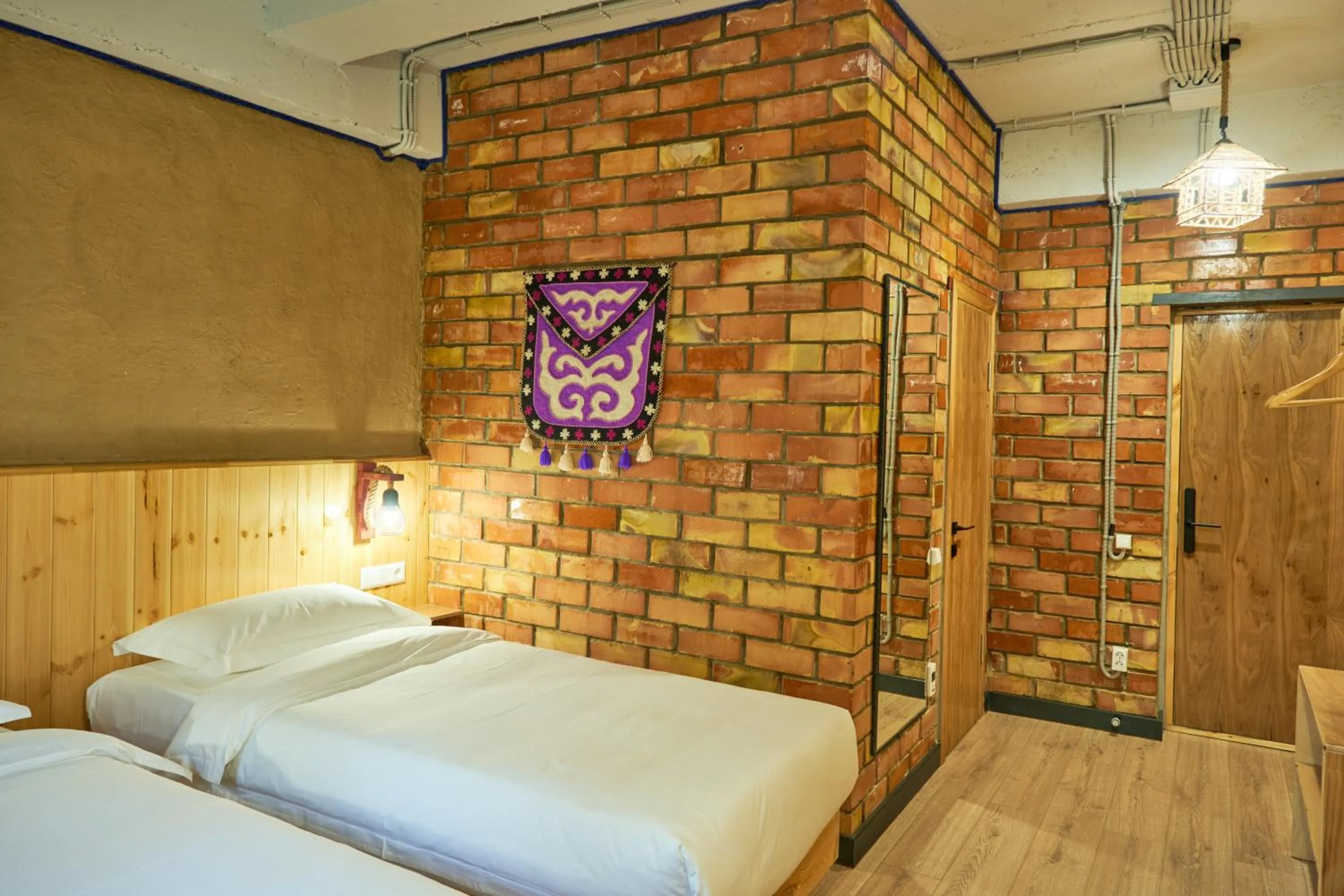 Bed in Pristine Hotel