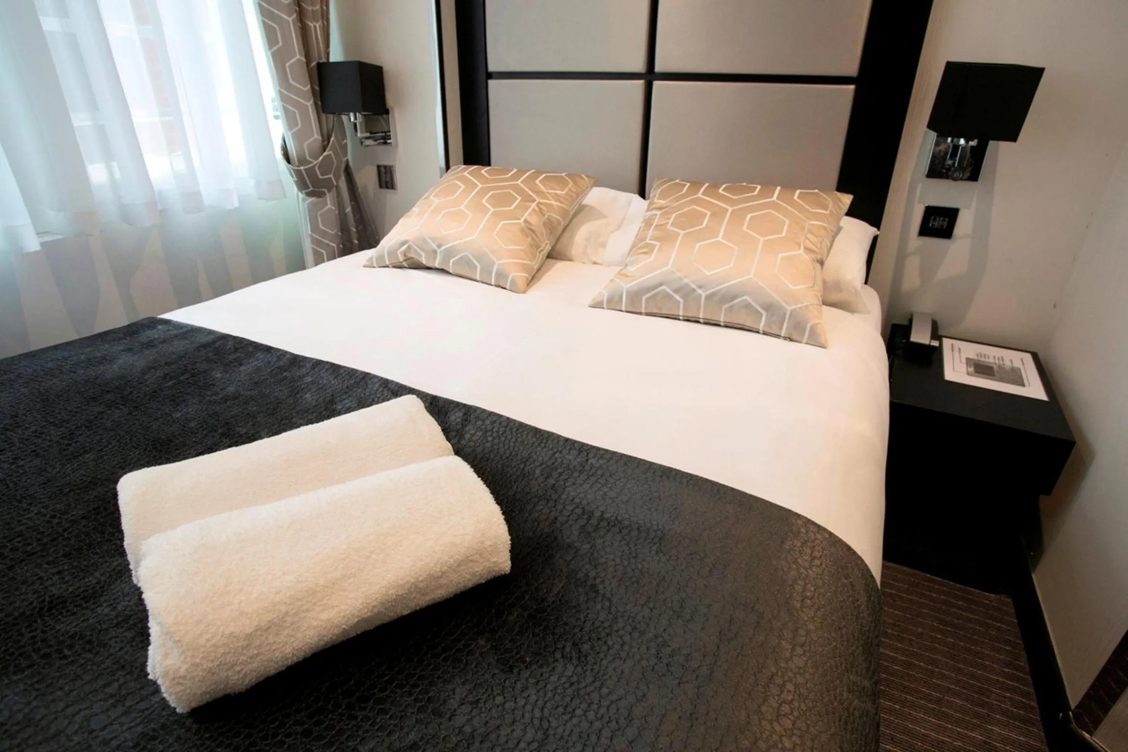 Bed in Great St Helen Hotel