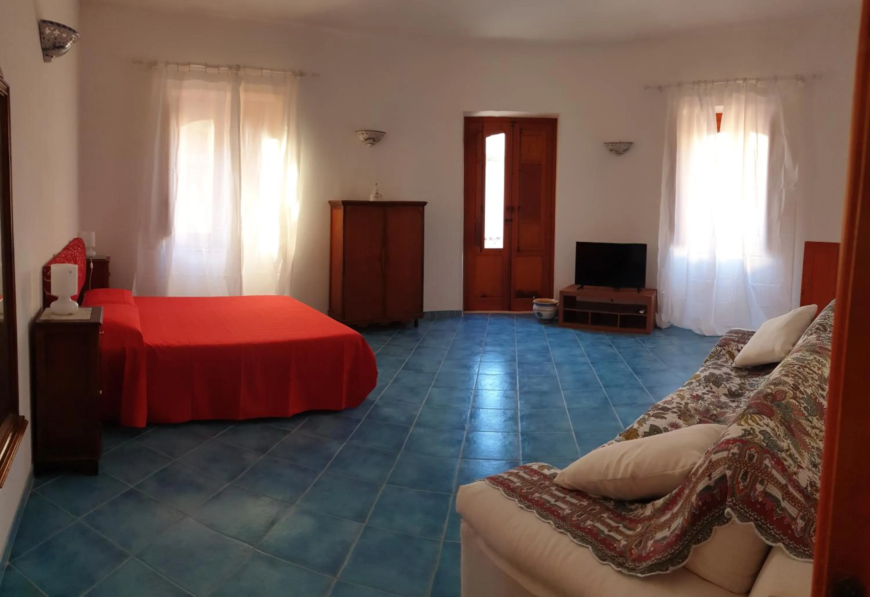 Photo of the whole room, Bed in A Casa Tunna