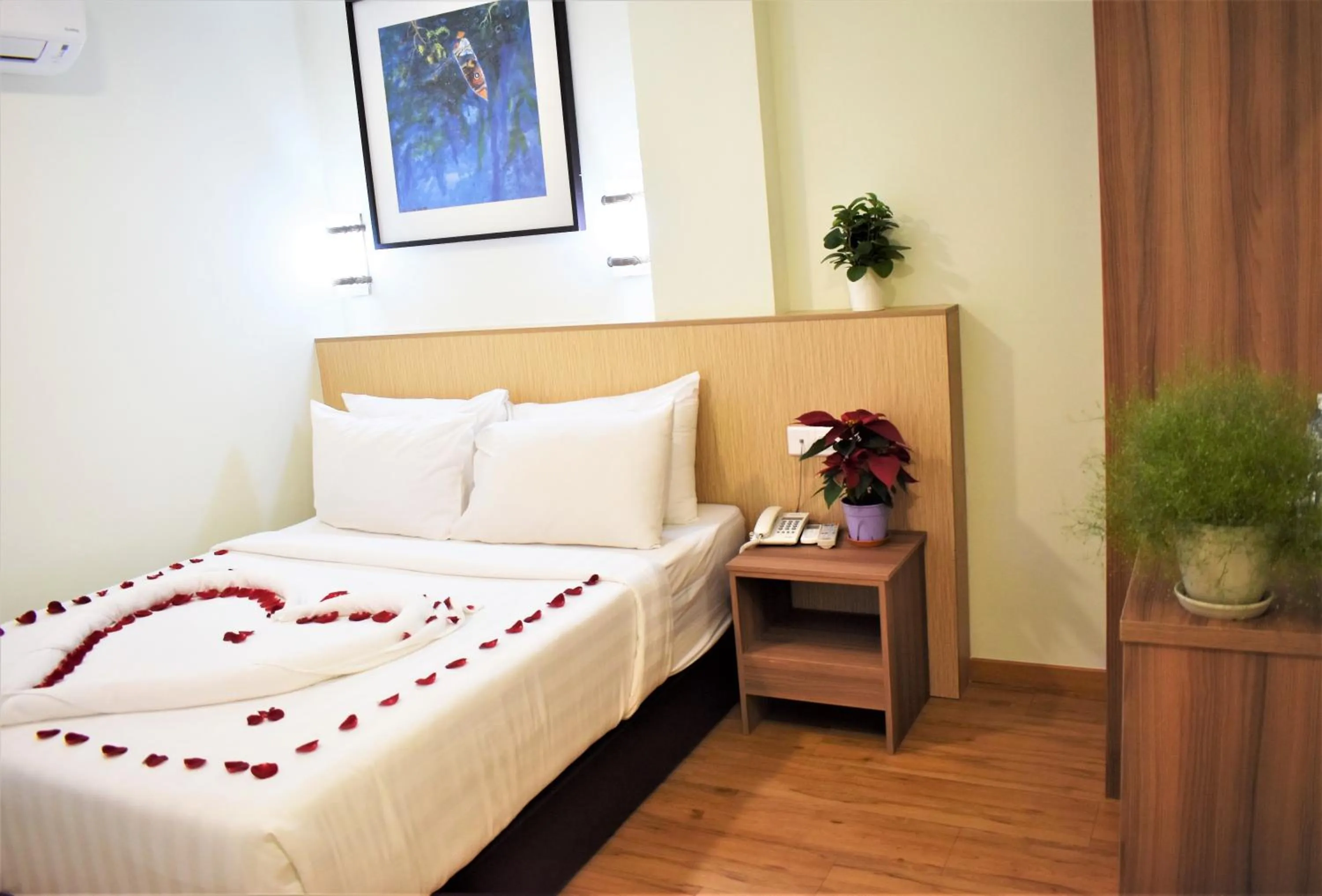 Bed in Xpeed Holiday Hotel