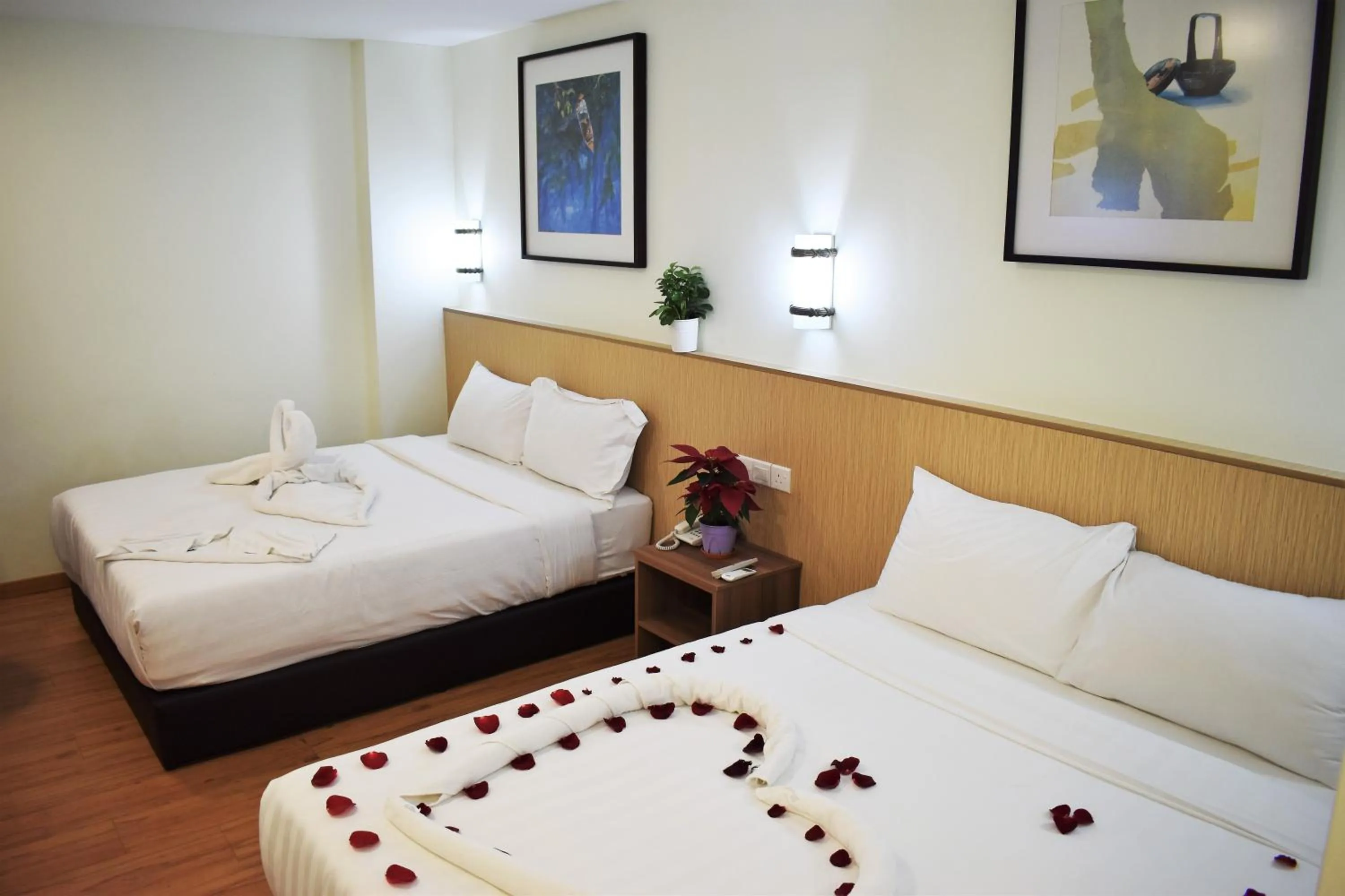 Bed in Xpeed Holiday Hotel