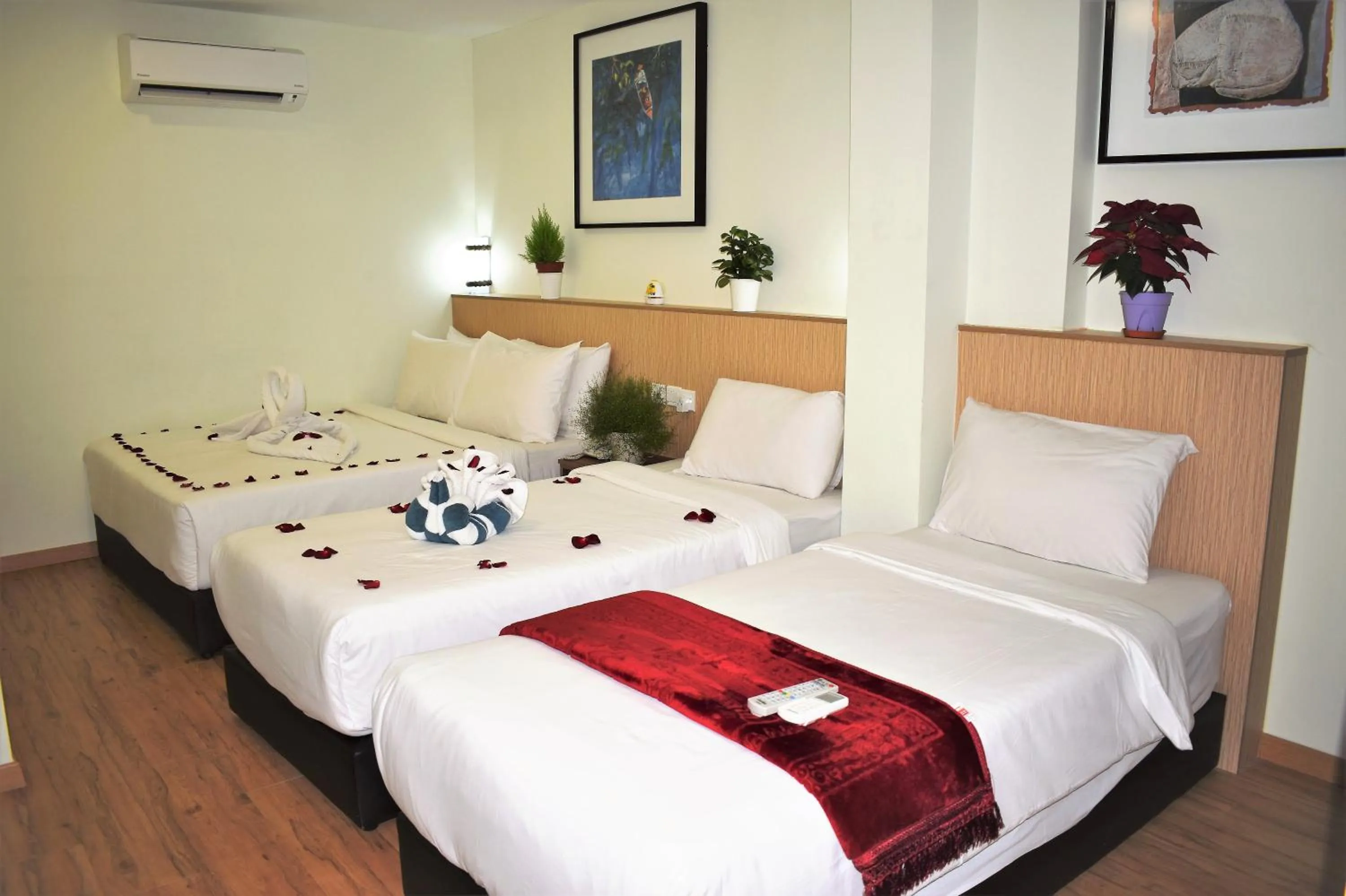 Bed in Xpeed Holiday Hotel