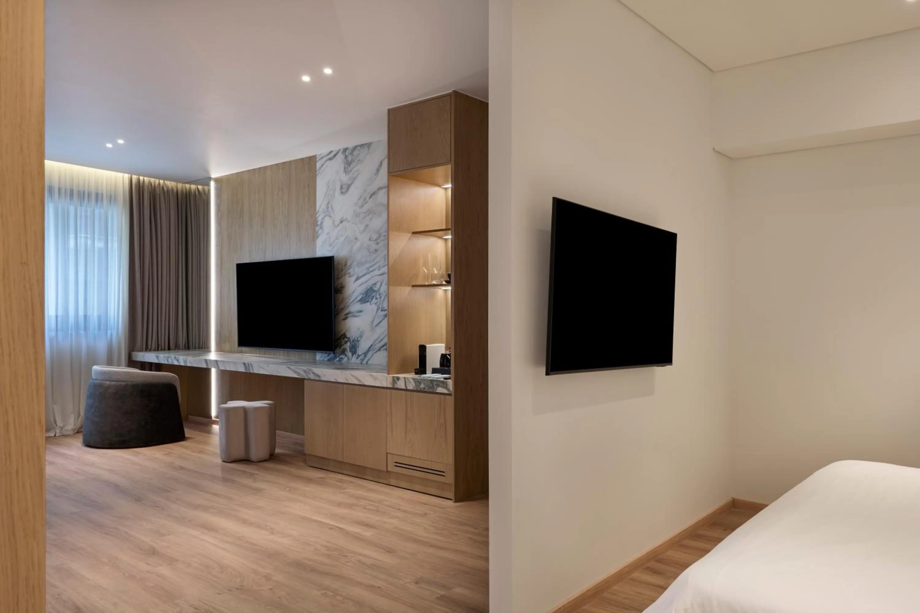 Seating area, Bed in Nur City Suites