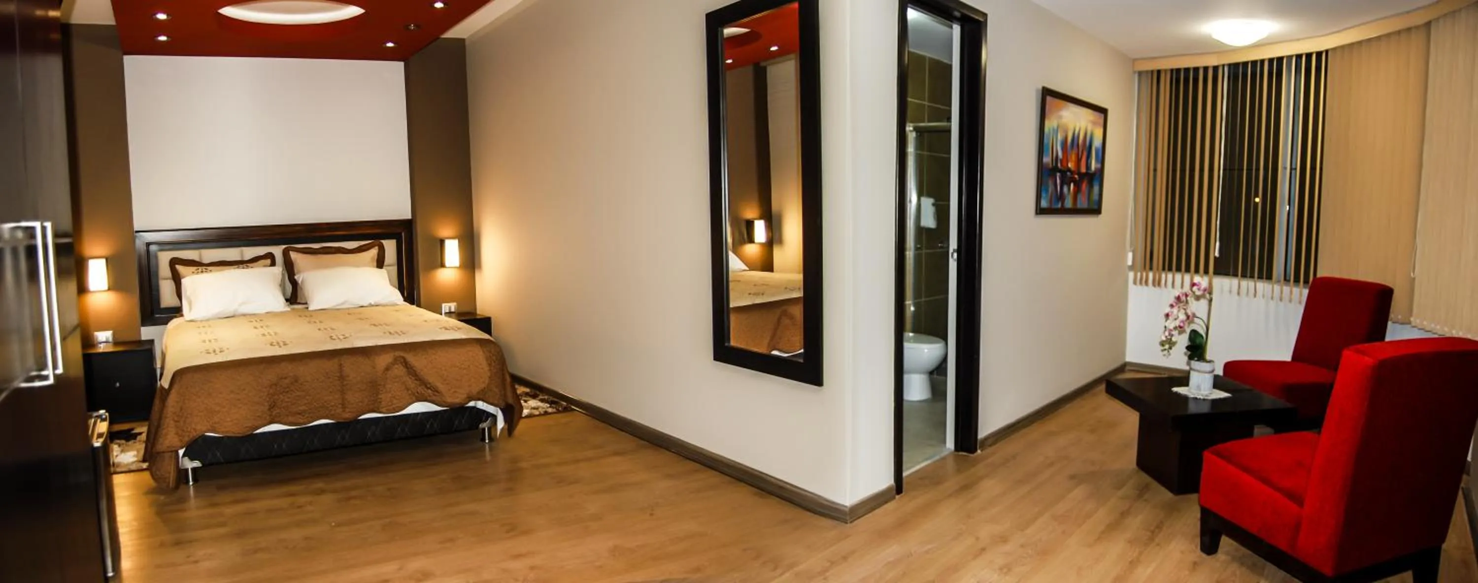 Bed in Plaza Sur Hotel & Suites