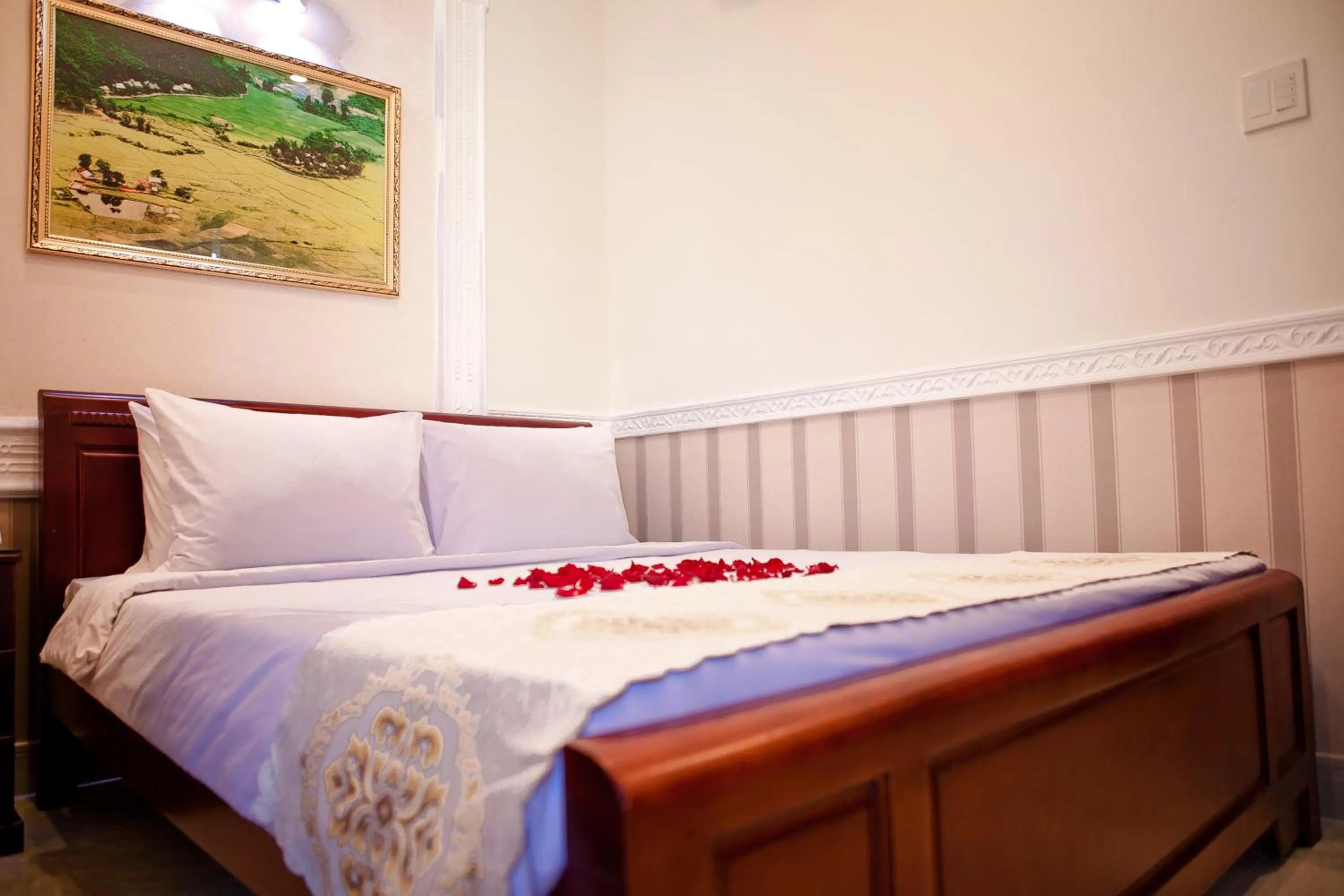 Photo of the whole room, Bed in Ngoc Lam Can Tho Hotel