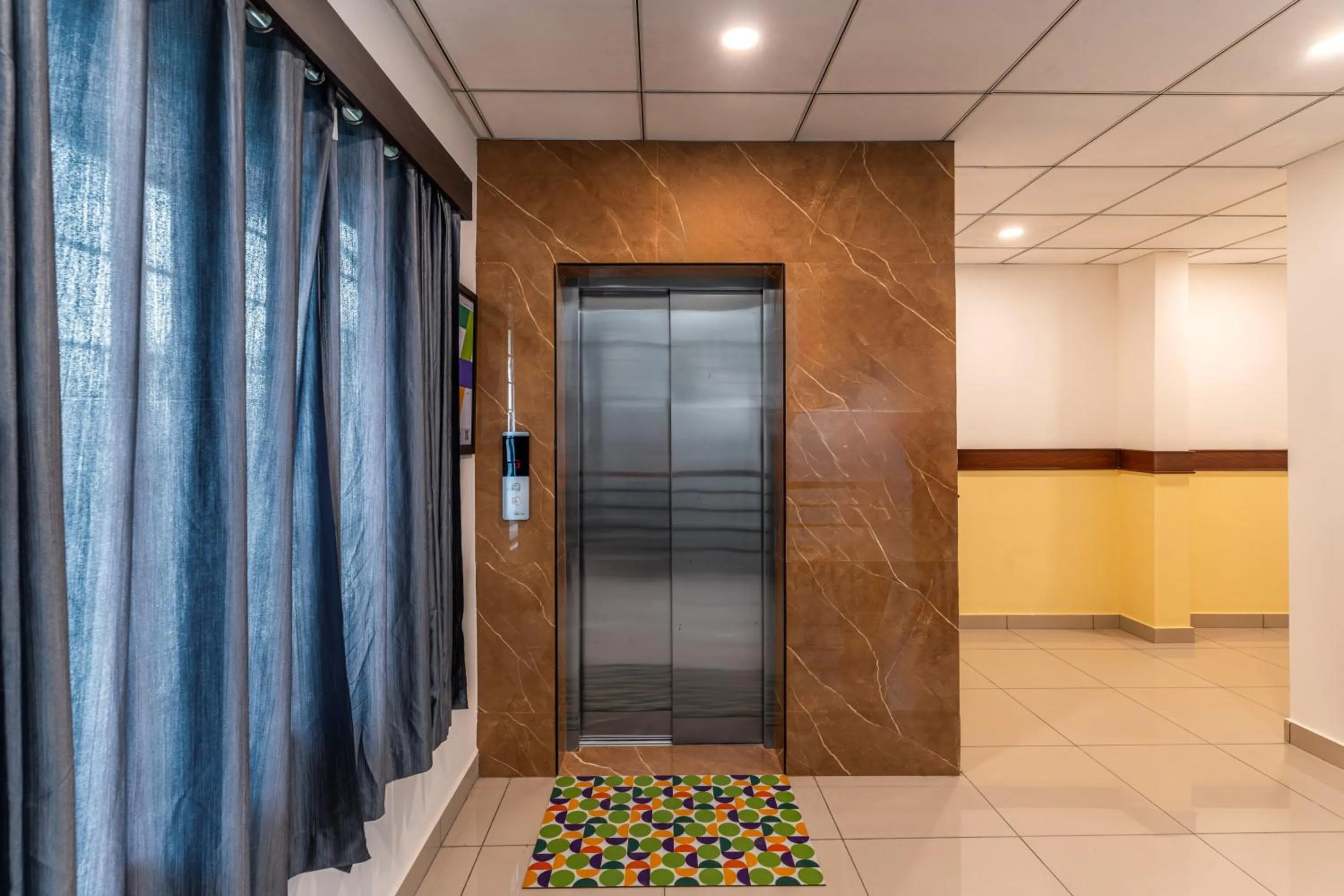 elevator in Treebo Urban Nest