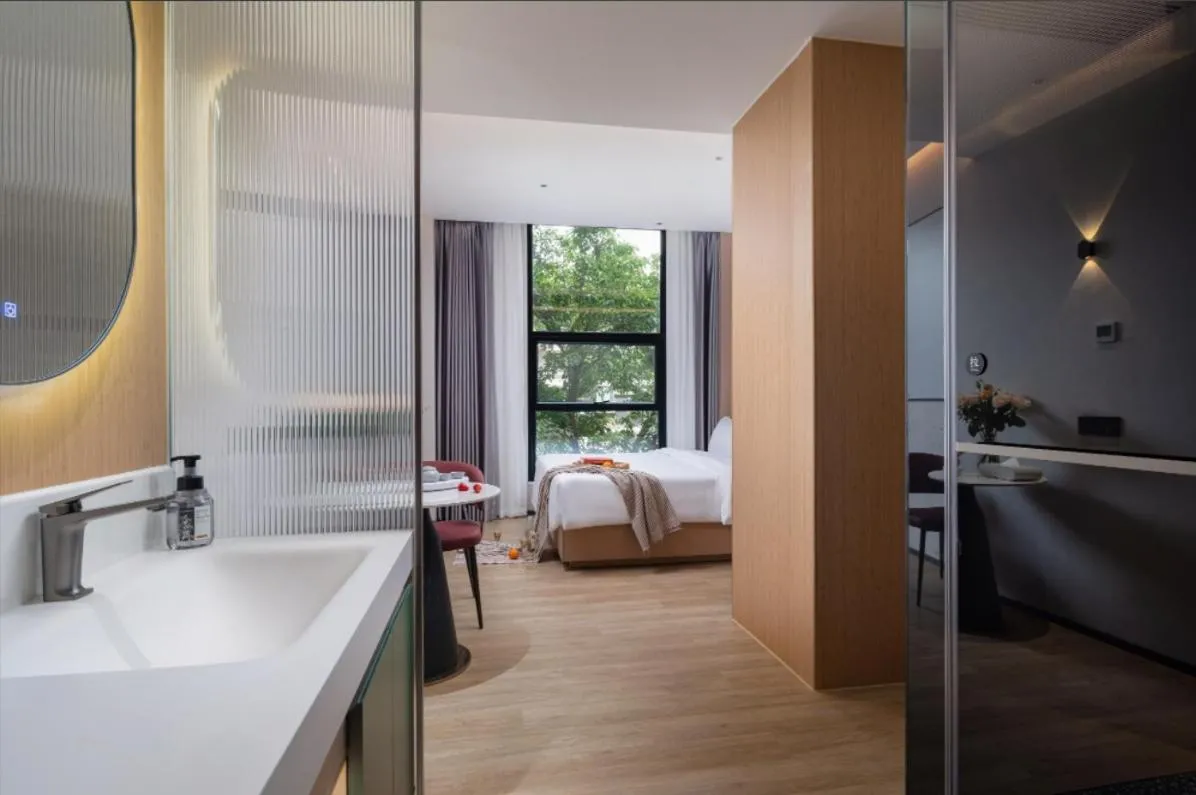 Bed in Kaino Natural Aesthetics Design Hotel Guangzhou Yuexiu Beijing Road International Trade Center Flagship Store