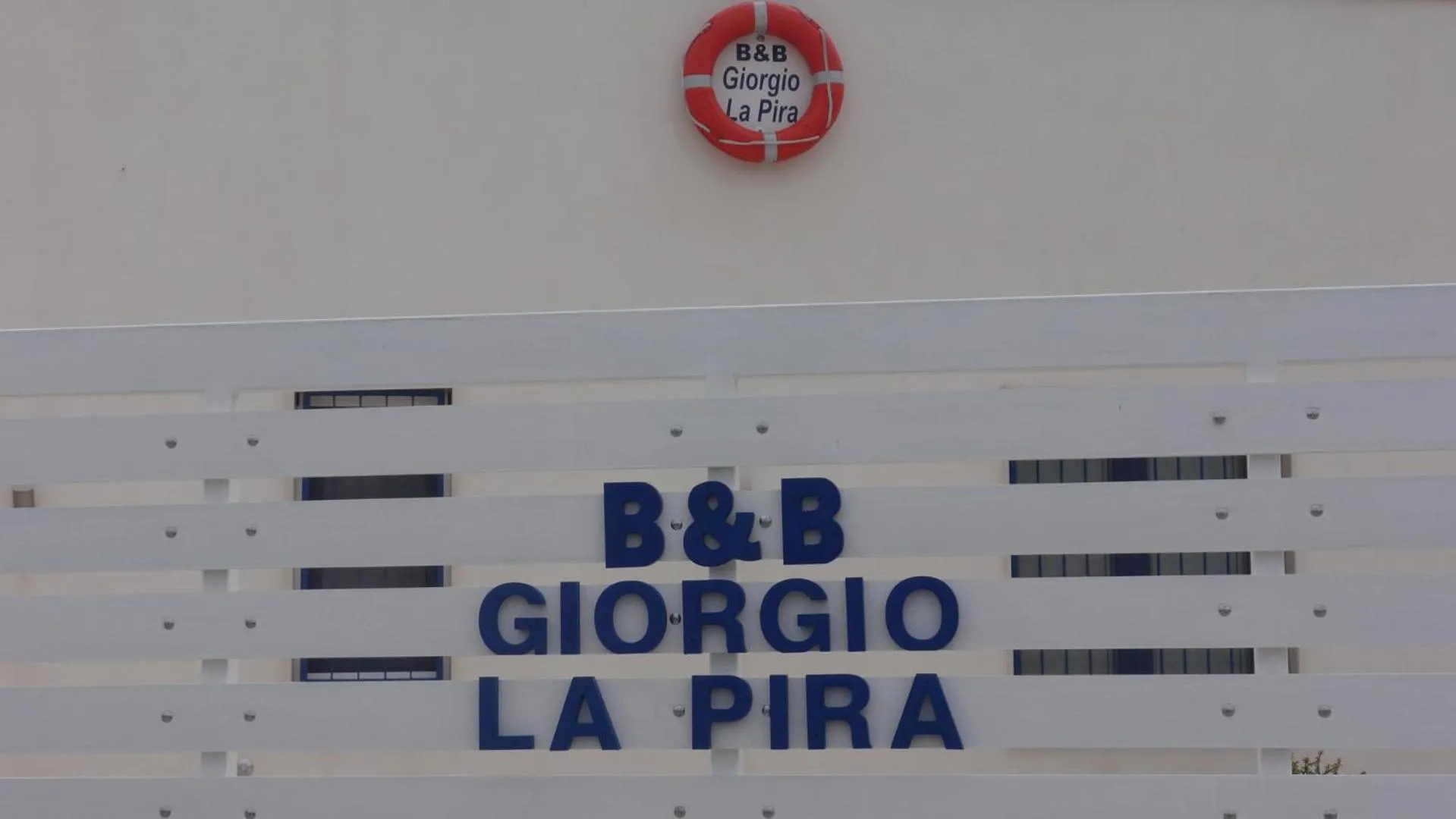 Property logo or sign in B&B Giorgio La Pira
