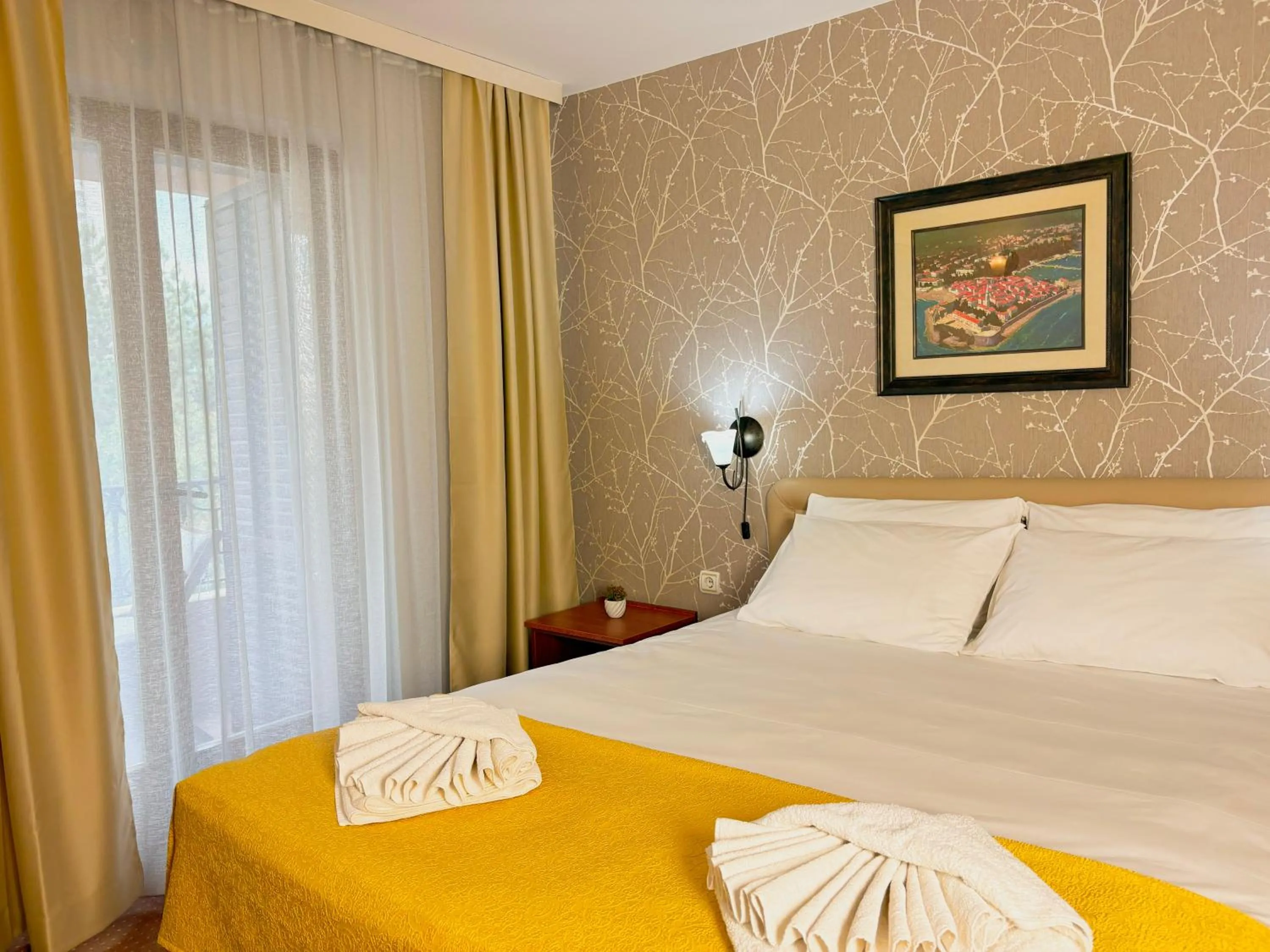 Bed in Central Hotel & Restaurant